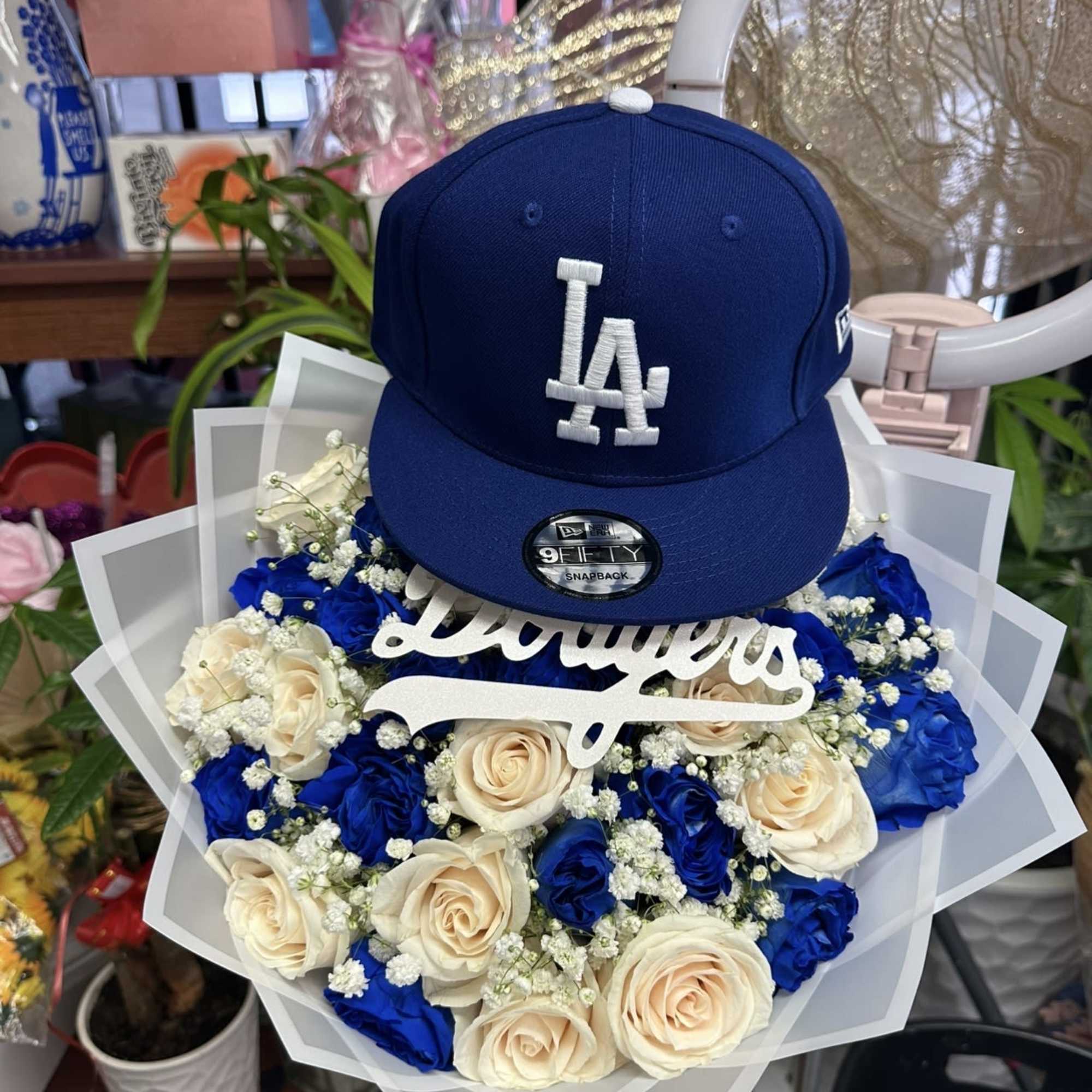 Roses and a hat for him 
Let us know the color you