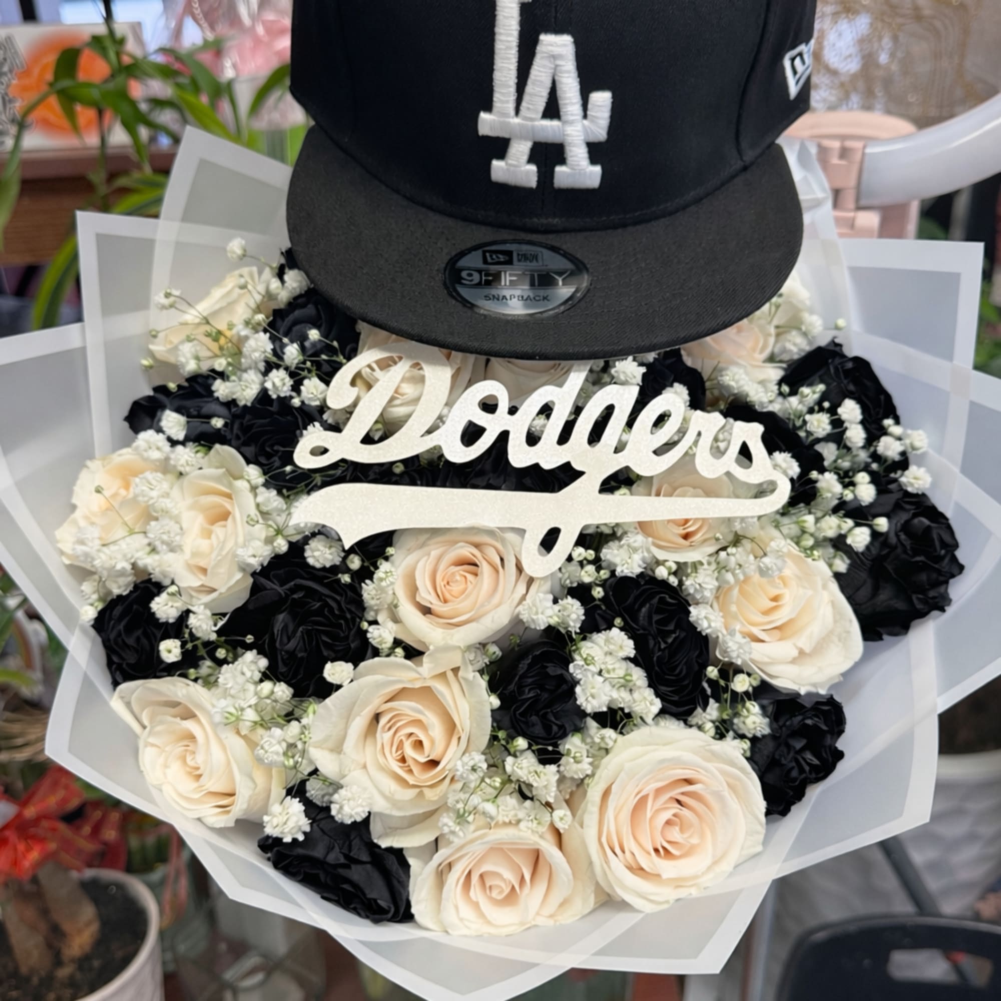 Roses and a hat for him 
Let us know the color you