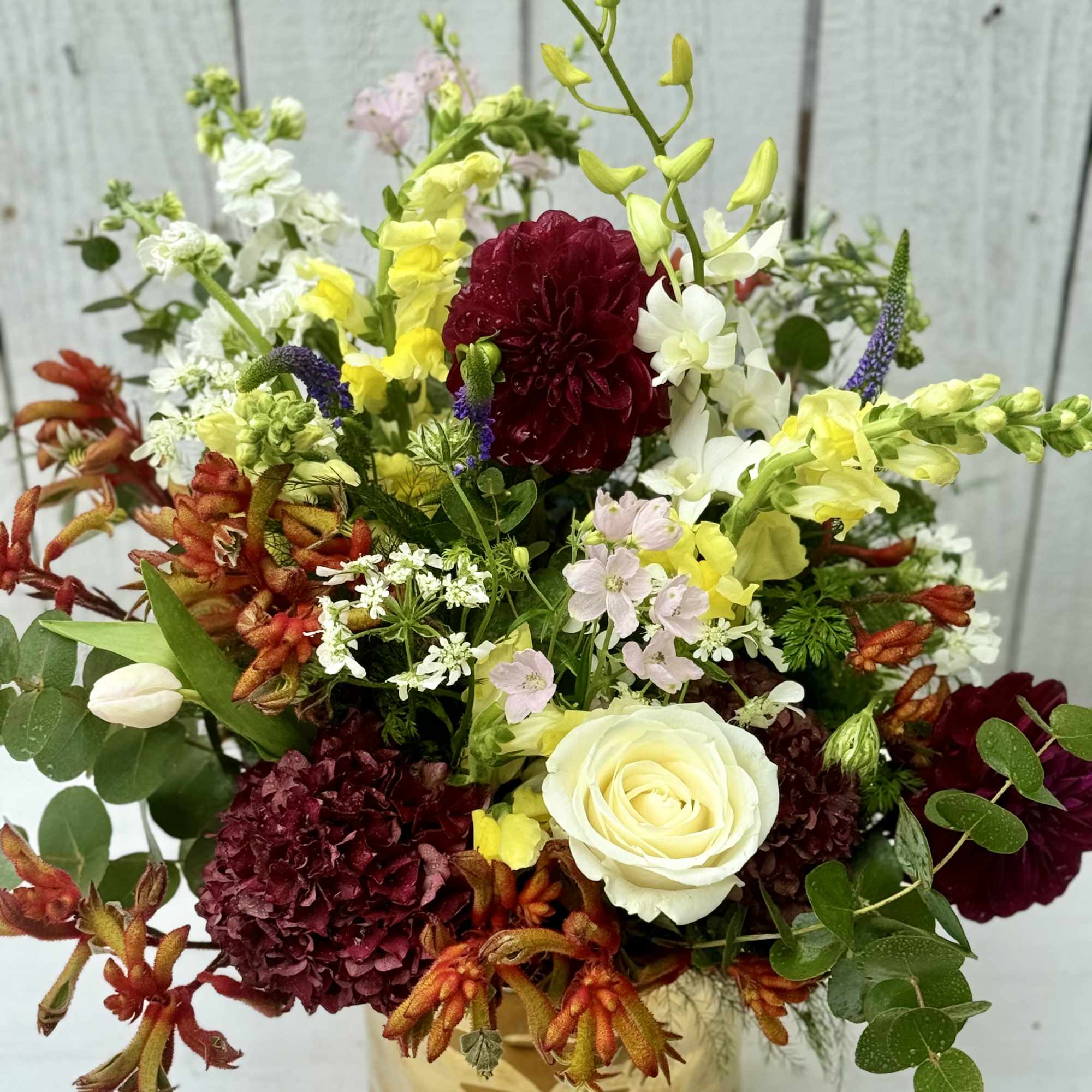 A gorgeous arrangement with all the colors of the desert. The dahlias