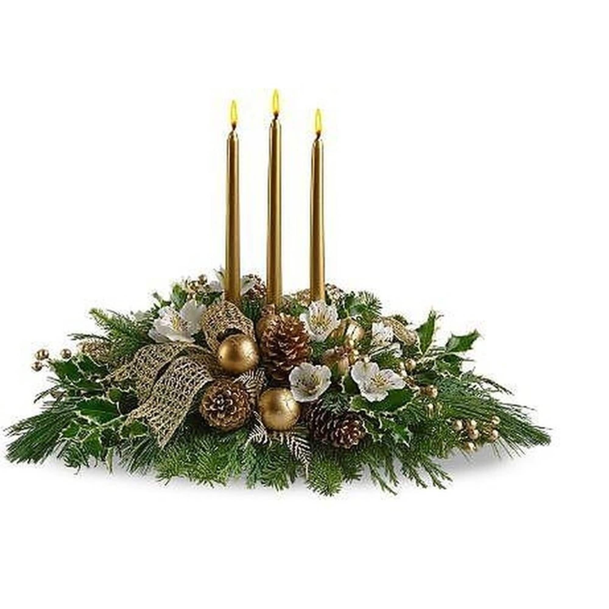 Low centerpiece with three gold candles, white flowers, pinecones, and gold ornaments