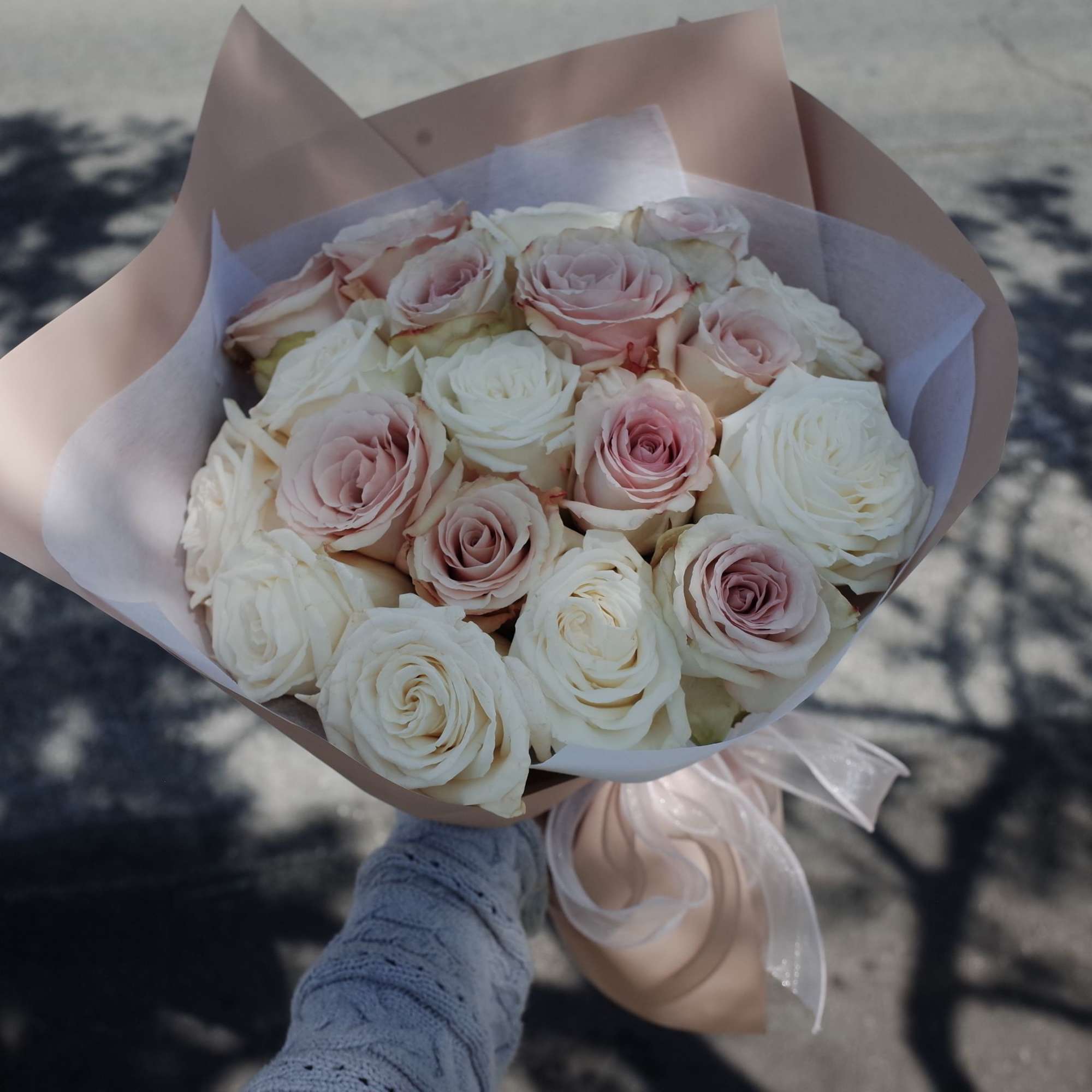 A soft, timeless bouquet featuring premium Quicksand roses in their signature champagne‑blush