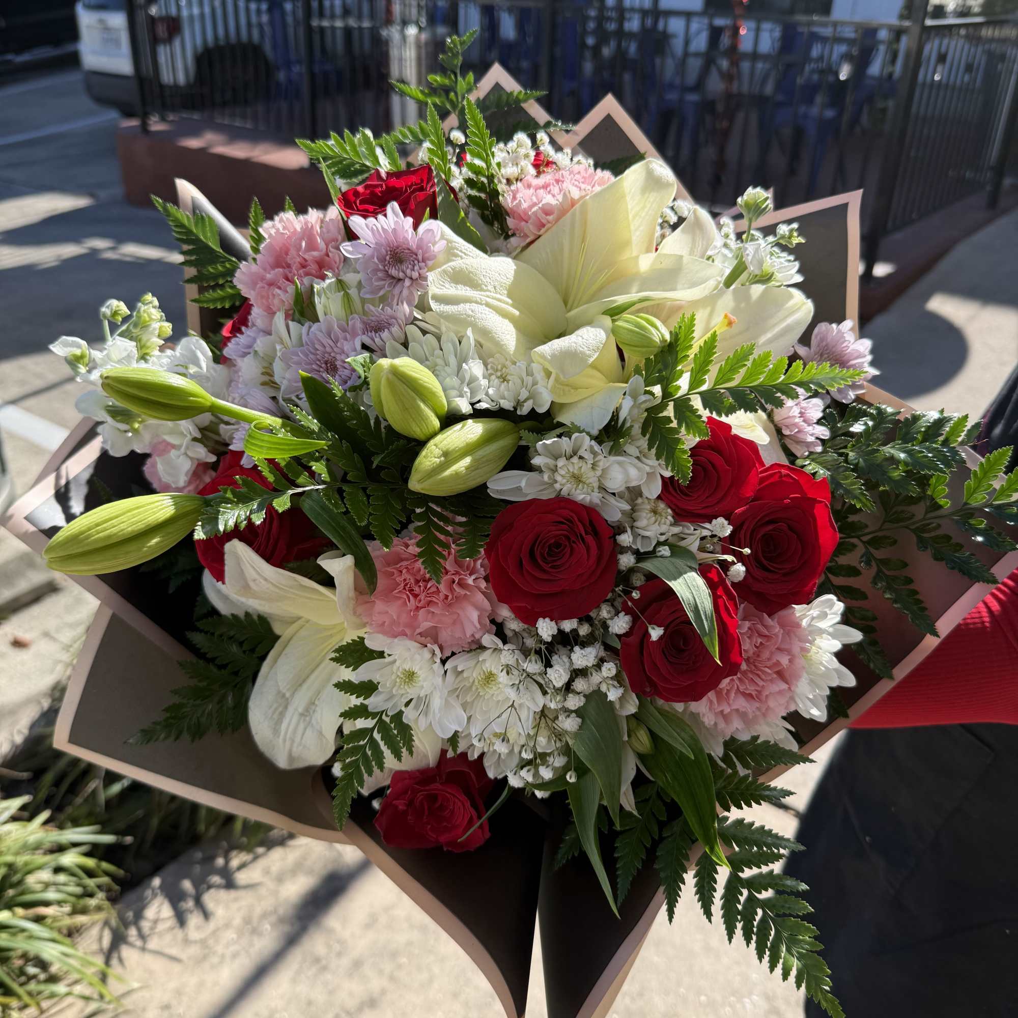 (WRAP-NO VASE) Sweet Obsession is a bold, romantic BUCH&Oacute;N-STYLE bouquet featuring creamy