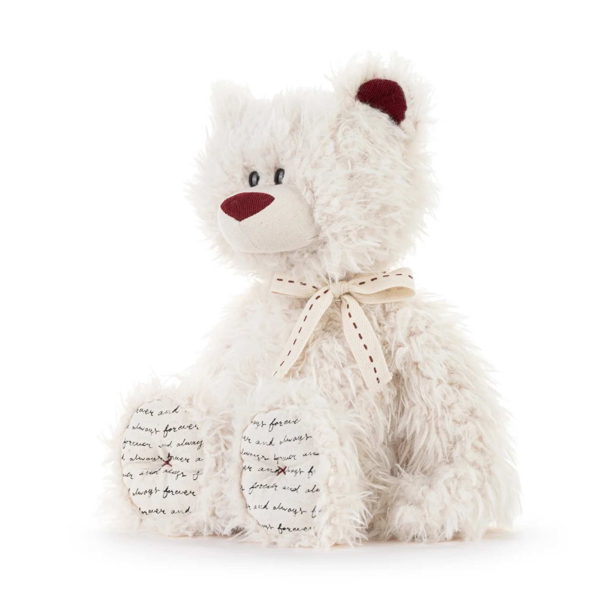 White plush teddy bear with a ribbon bow and red nose