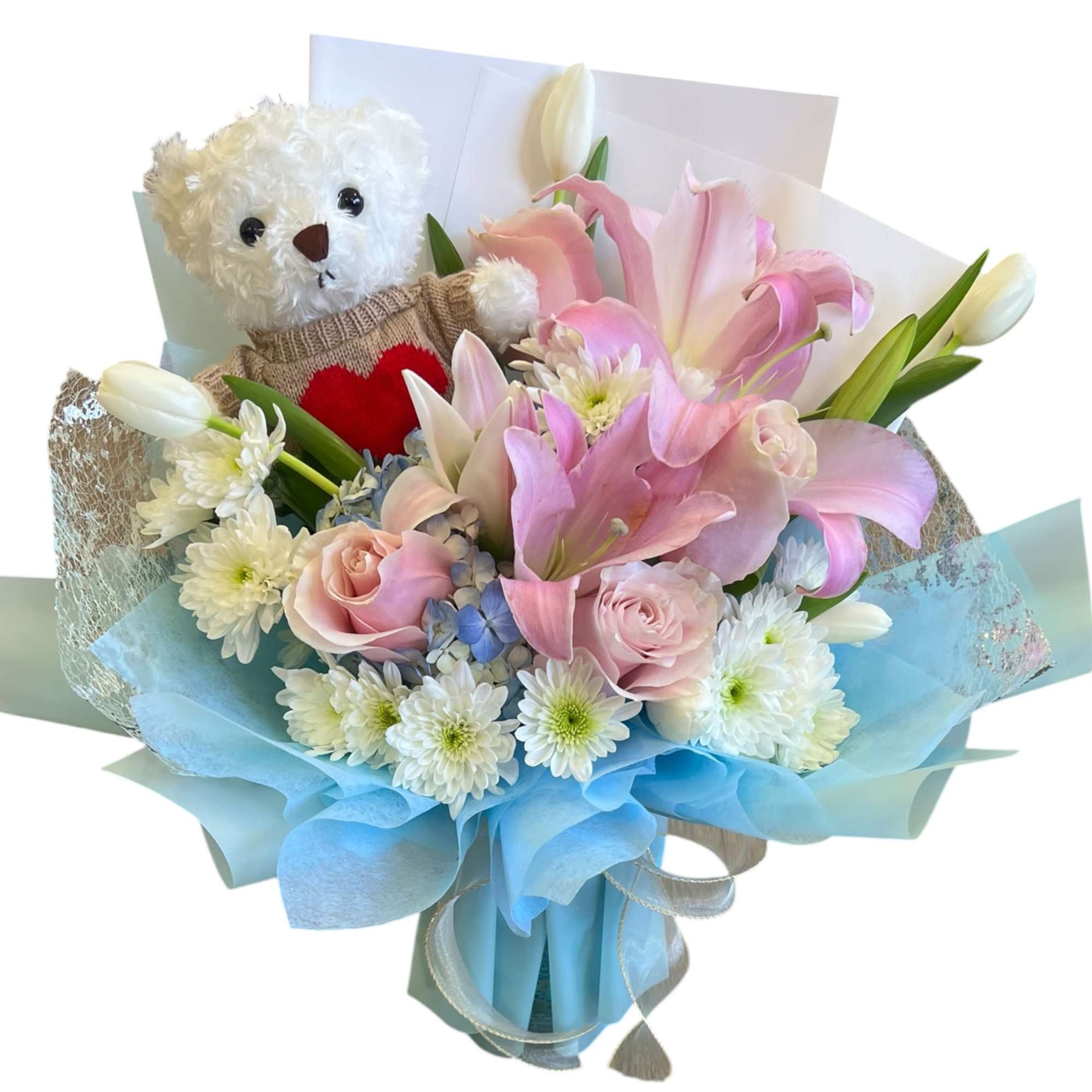 A charming bouquet featuring soft pink lilies, roses, and delicate white blooms