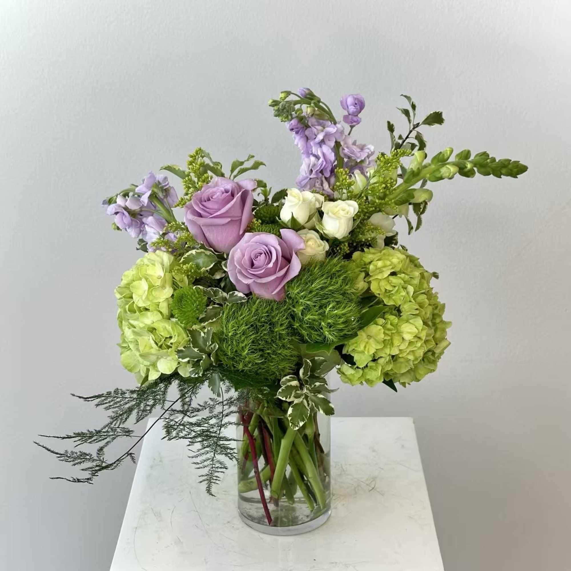 Discover the serene elegance of the Lavender Matcha flower arrangement. This beautiful