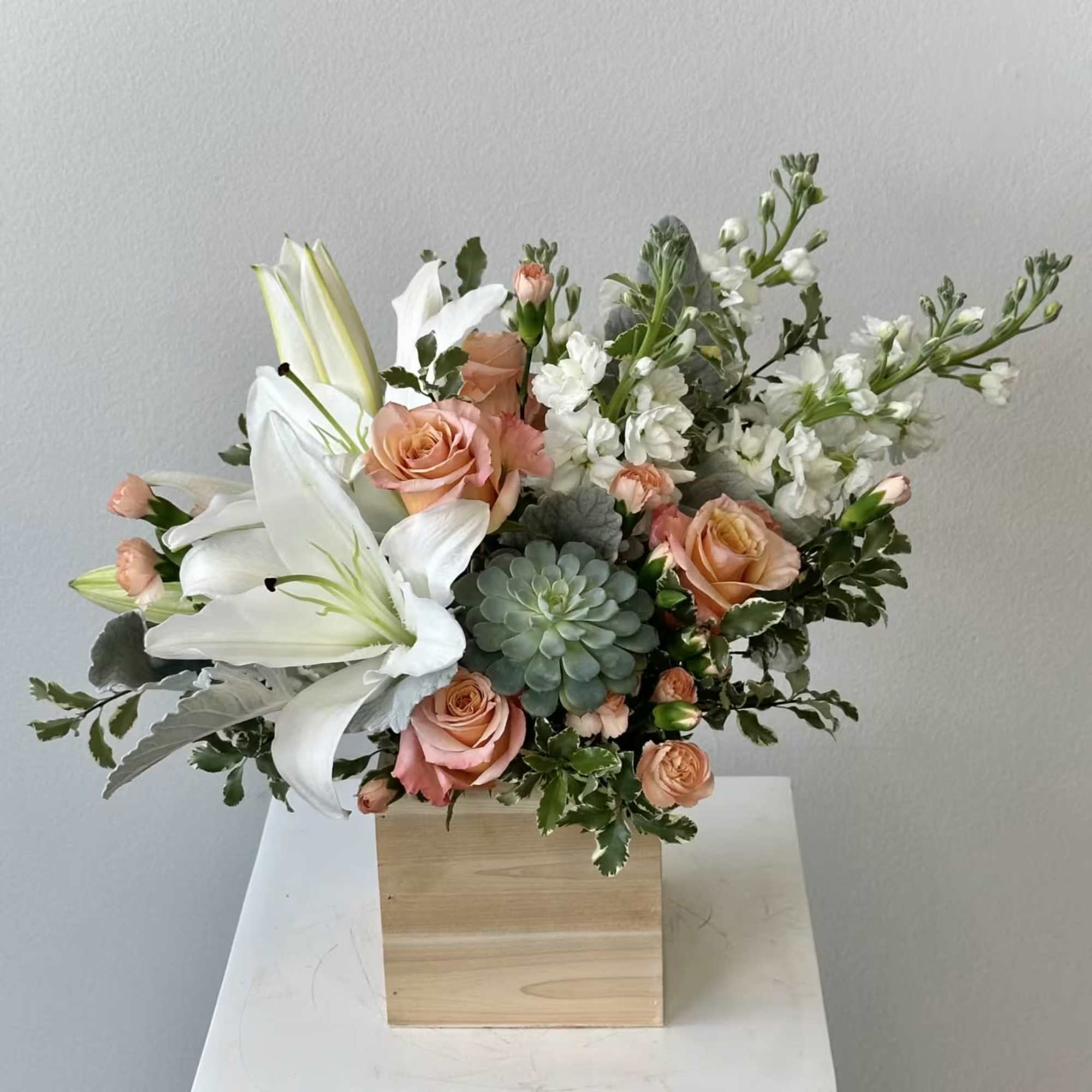 Experience the serene elegance of the Desert Sunrise flower arrangement, featuring soft