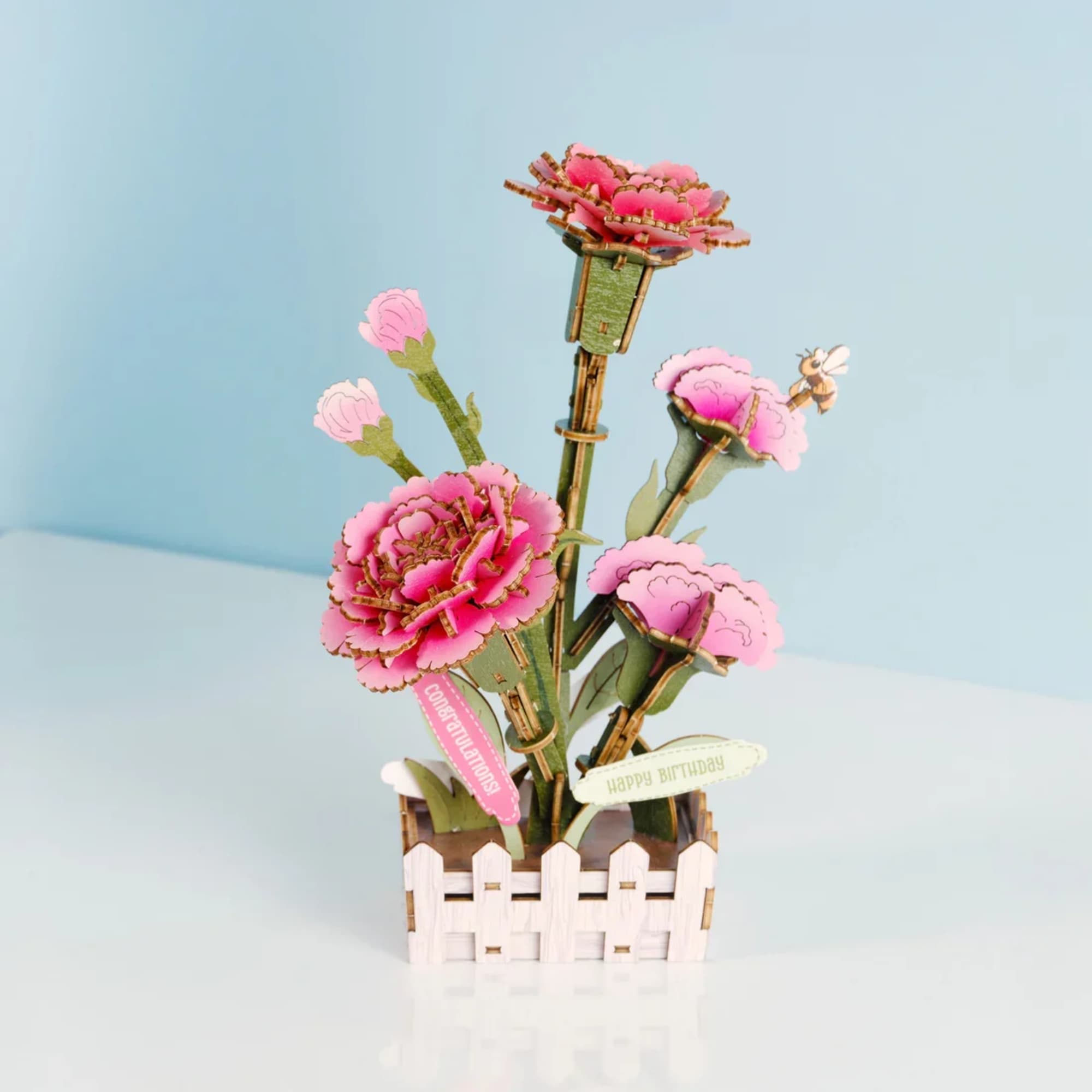 Create a beautiful carnation with this DIY miniature wooden puzzle. Designed to