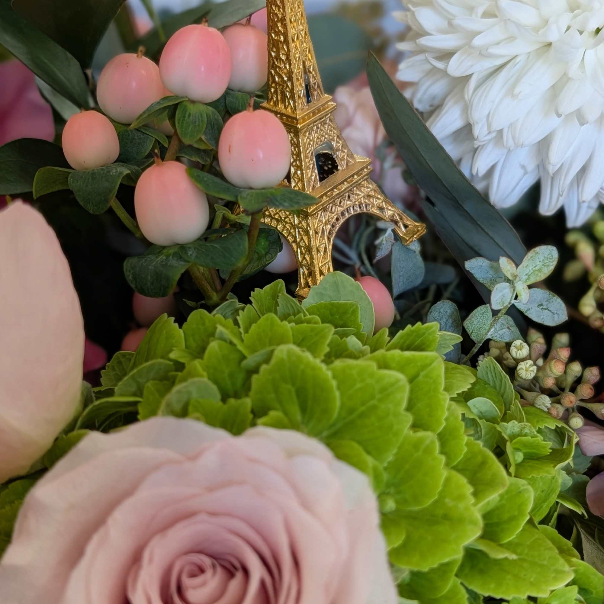 A garden style of soft blush, cream of seasonal flowers design in