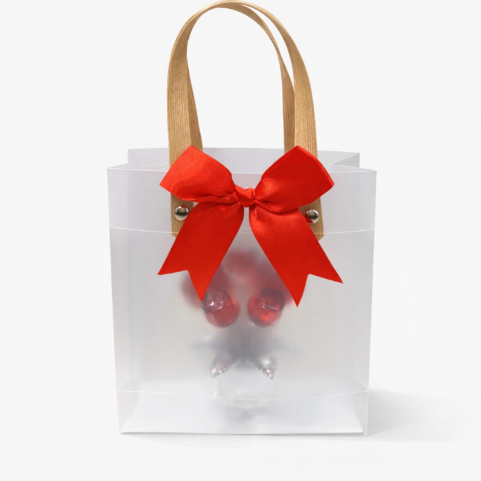 Clear gift bag with a red bow and visible chocolates inside