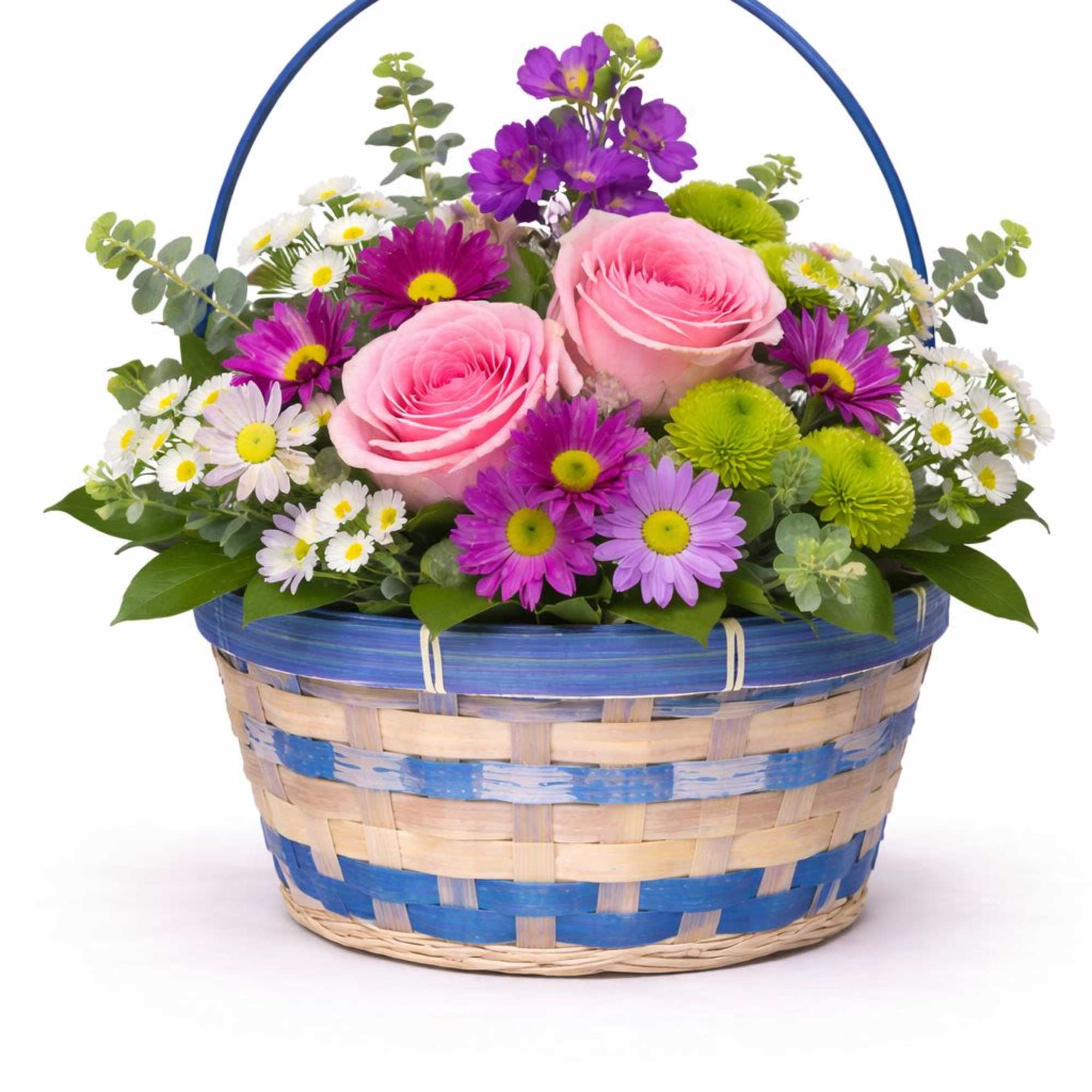 Pink roses and purple daisies in a blue-handled basket