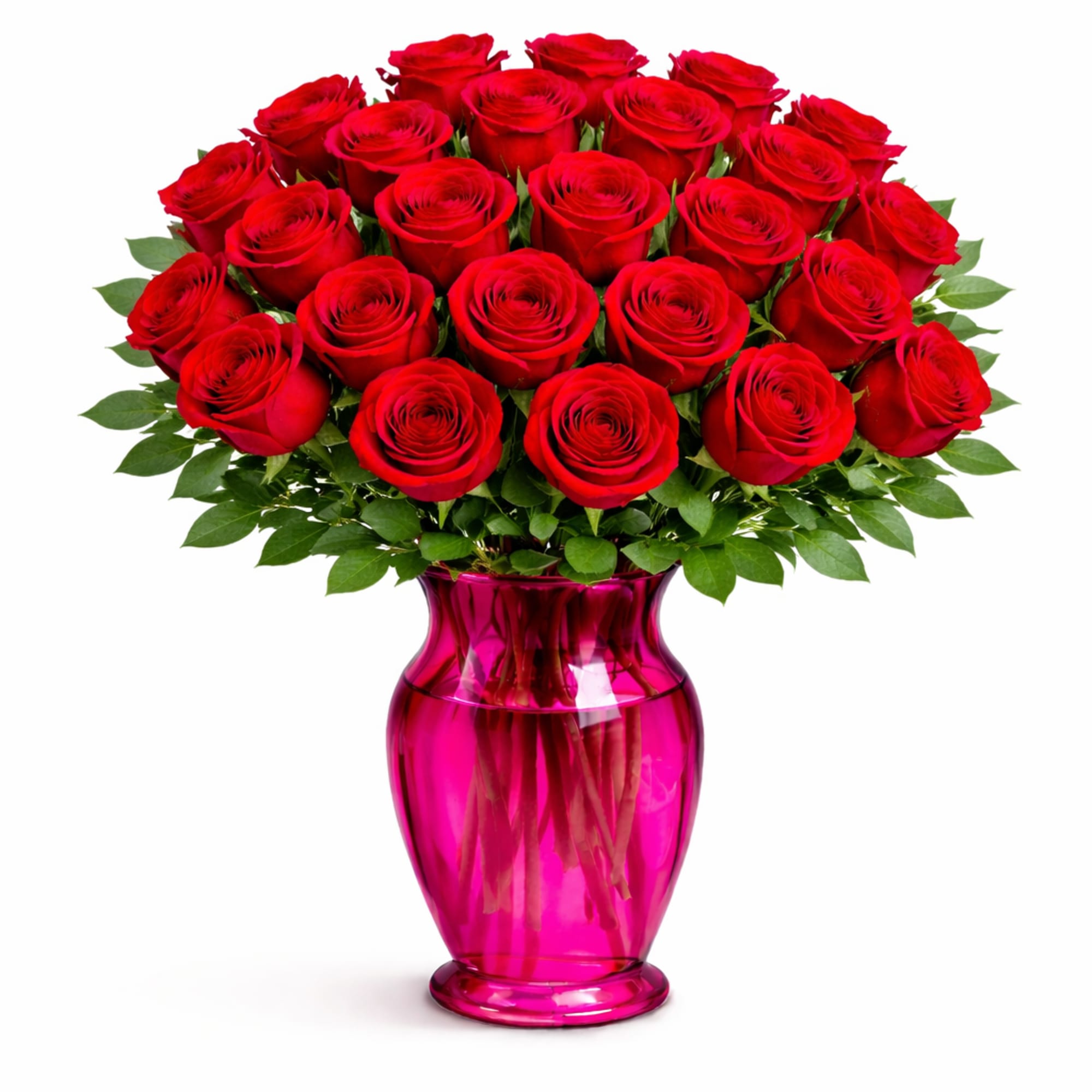 Red roses arranged in a pink glass vase