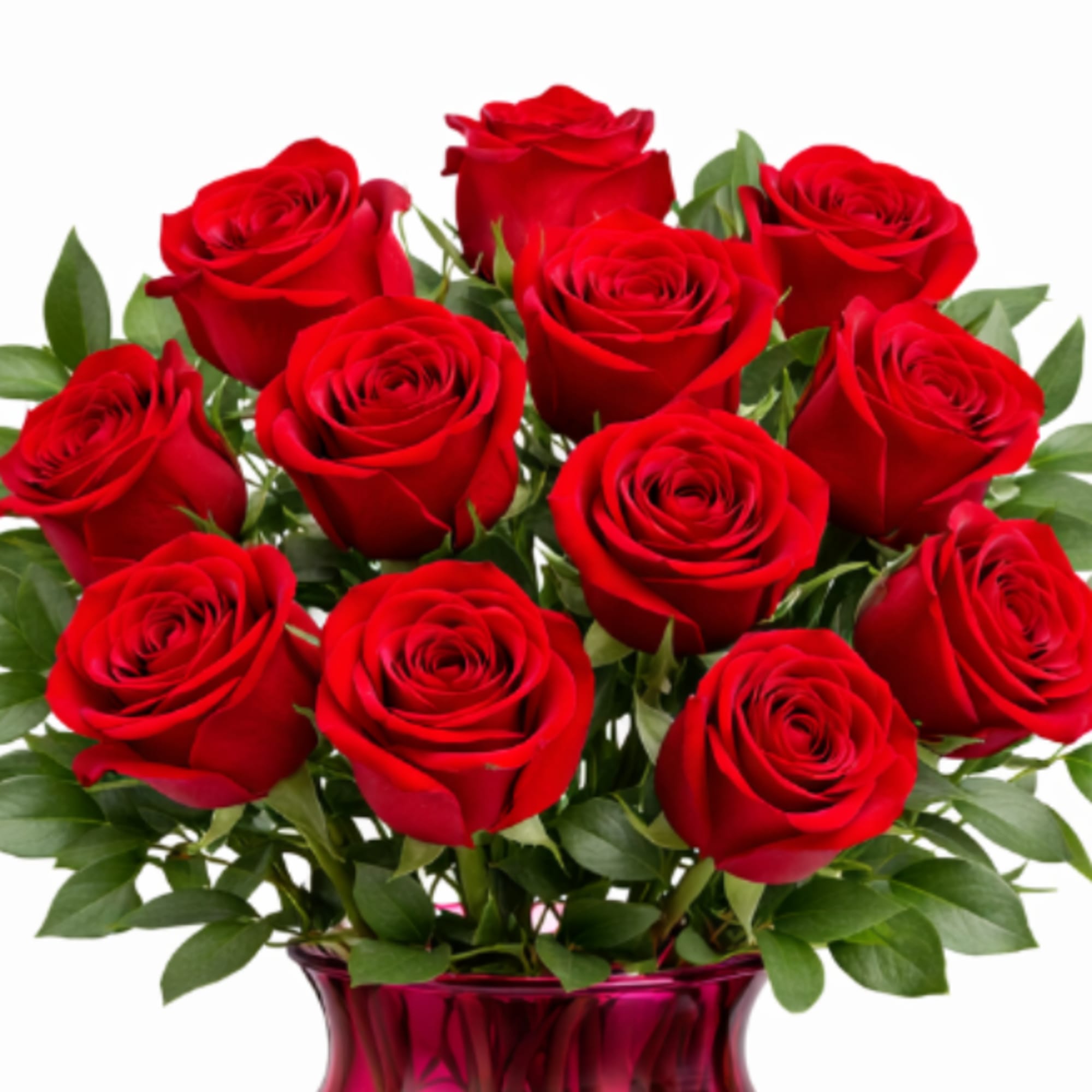 Bouquet of red roses in a pink glass vase