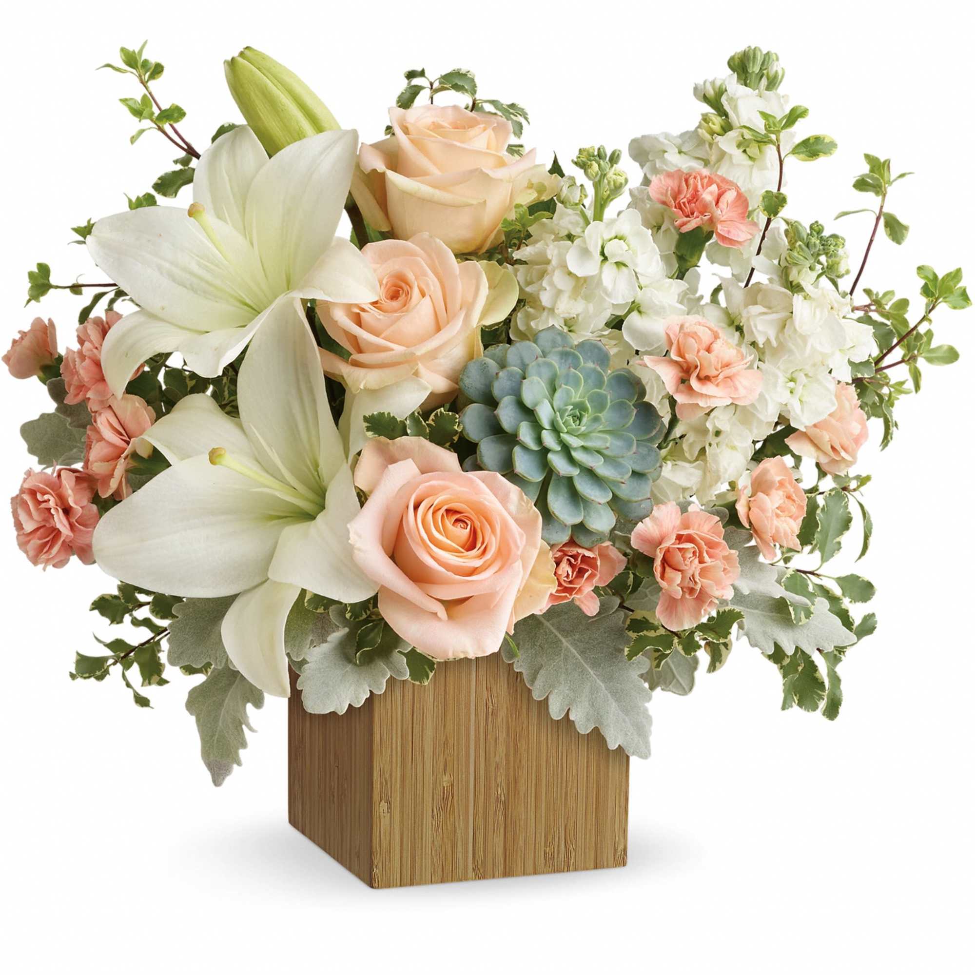 Peach roses and white lilies in a wooden cube vase