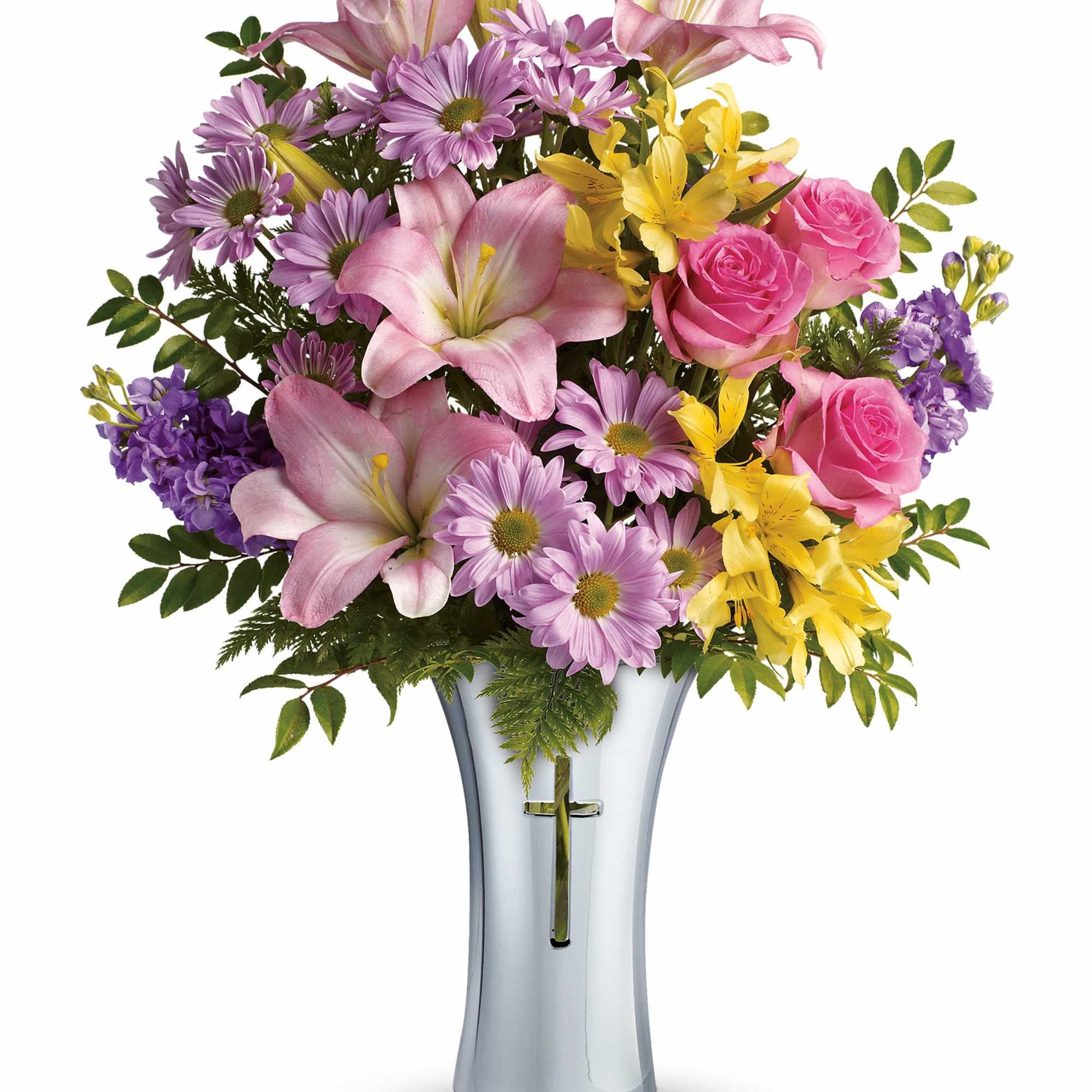 Mixed bouquet of pink lilies, roses, and purple daisies in a glass vase