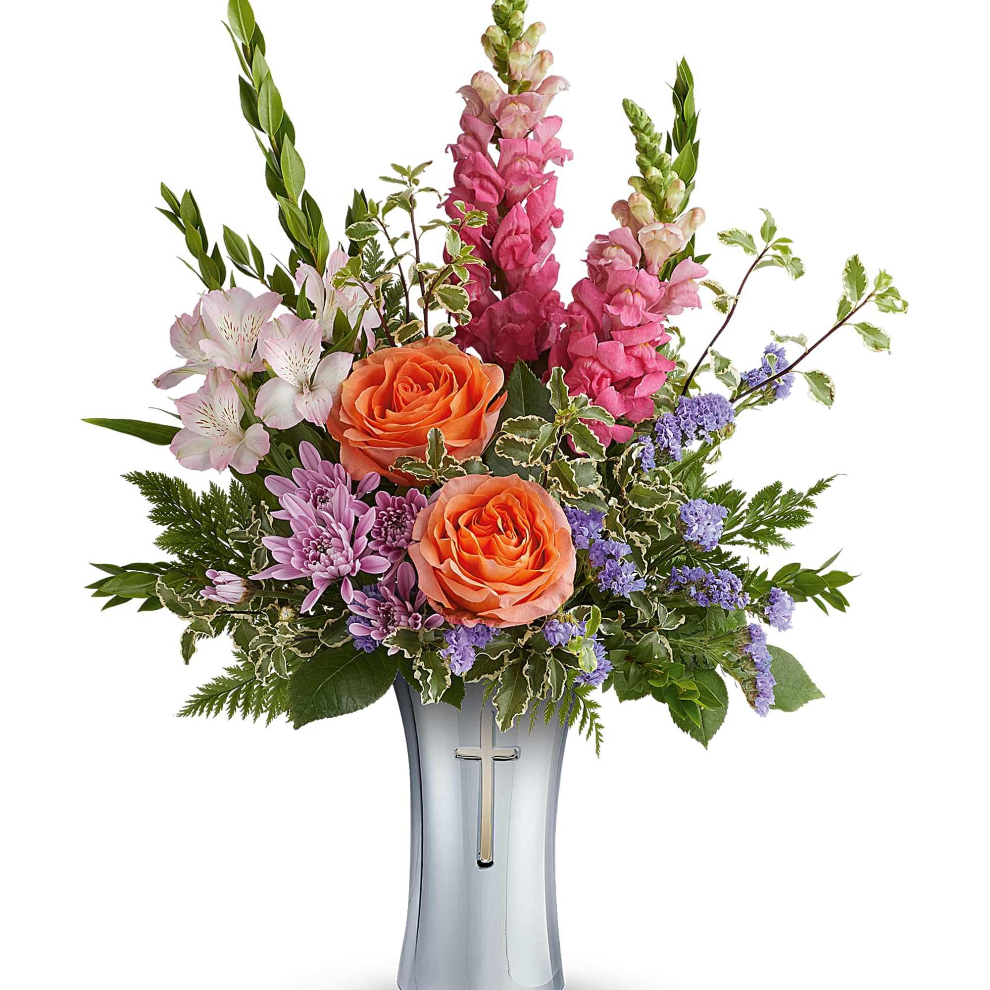 Mixed bouquet in a silver vase with a cross emblem