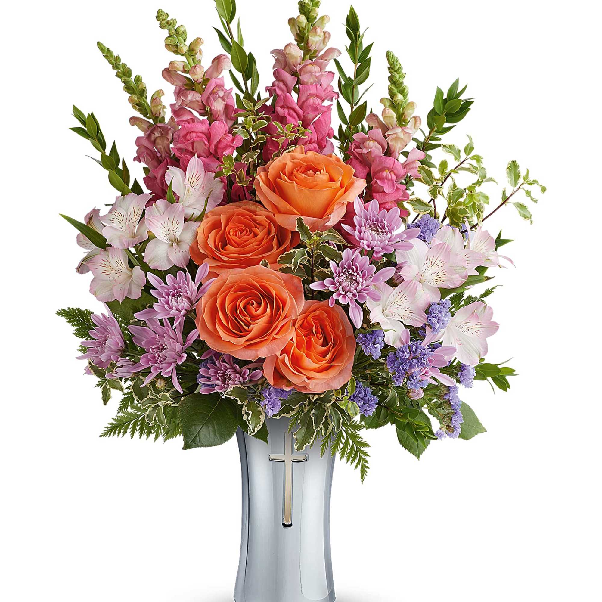 Bouquet of orange roses, pink snapdragons, and purple daisies in a silver vase
