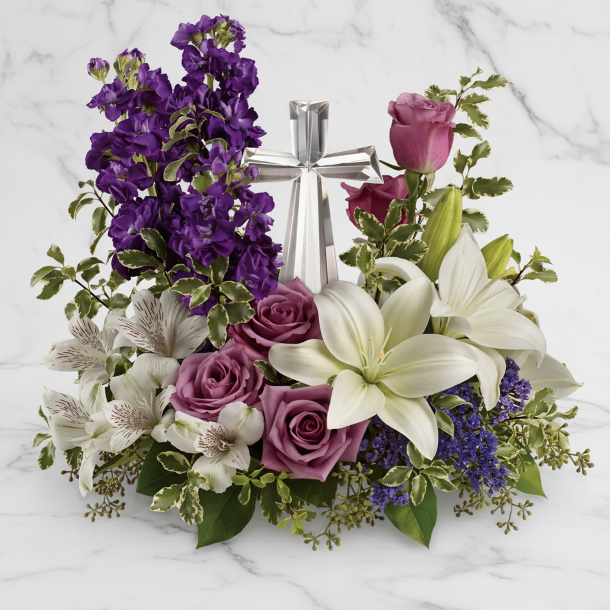 A bouquet to remember. This glorious garden of roses, lilies and alstroemeria