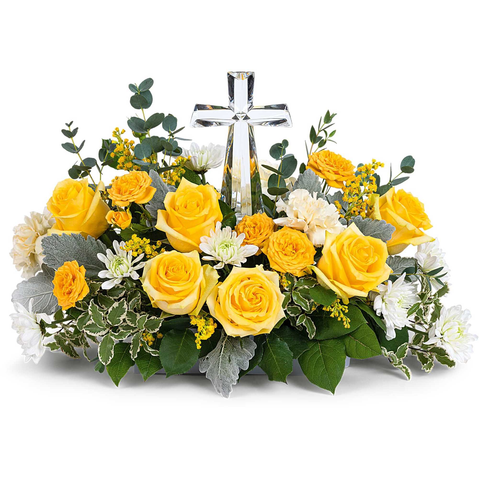 Yellow roses and white daisies arranged around a clear glass cross