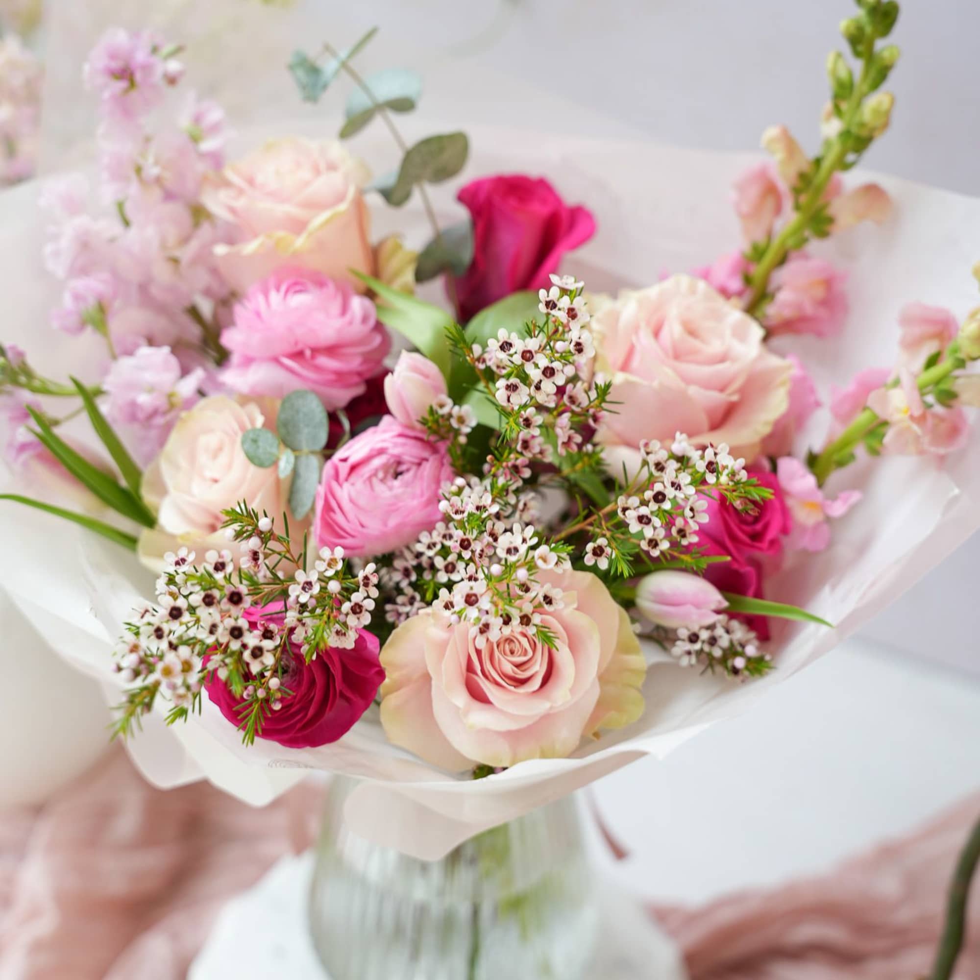 A medium-sized bouquet made with seasonal flowers that are available in our