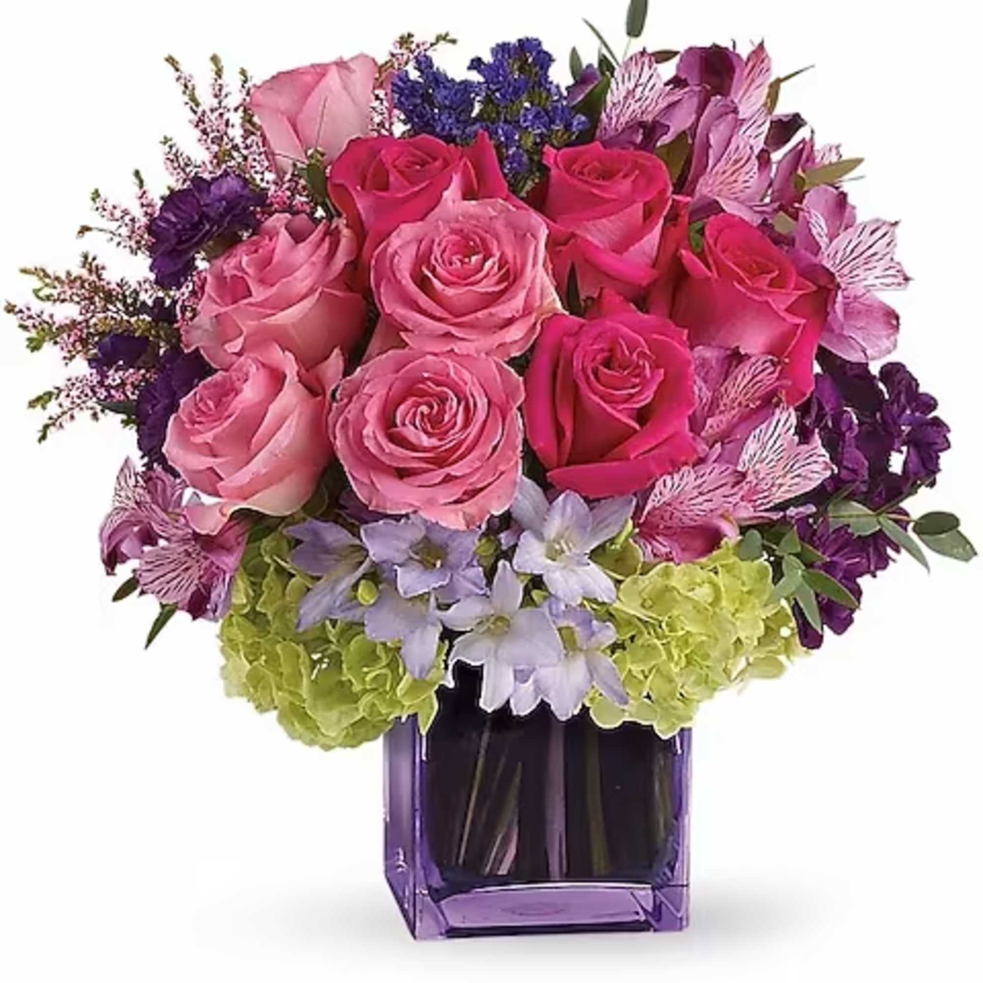 This exquisite mix of feminine blooms is like a breath of fresh