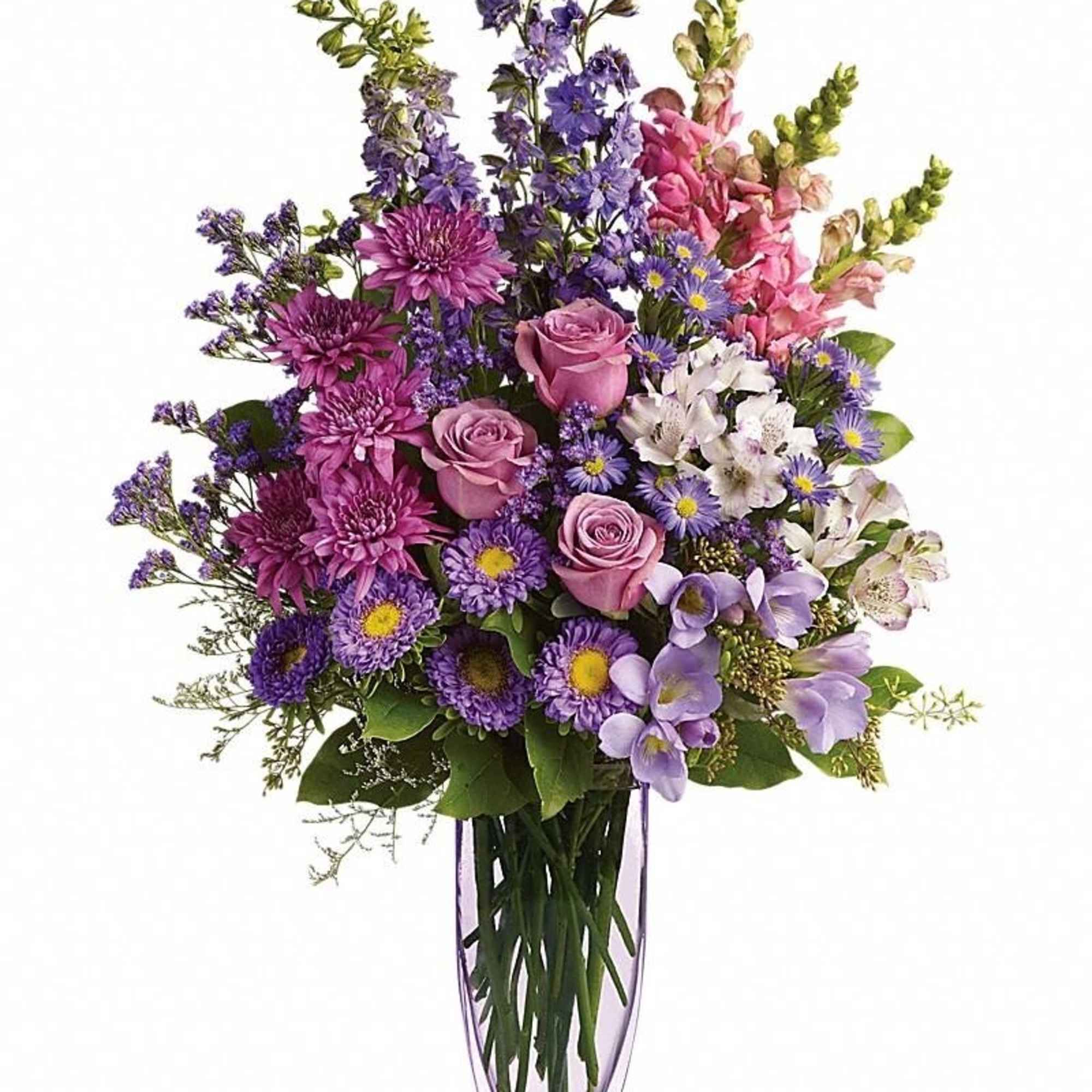 Tall arrangement of pink and purple flowers in a slender lavender glass vase