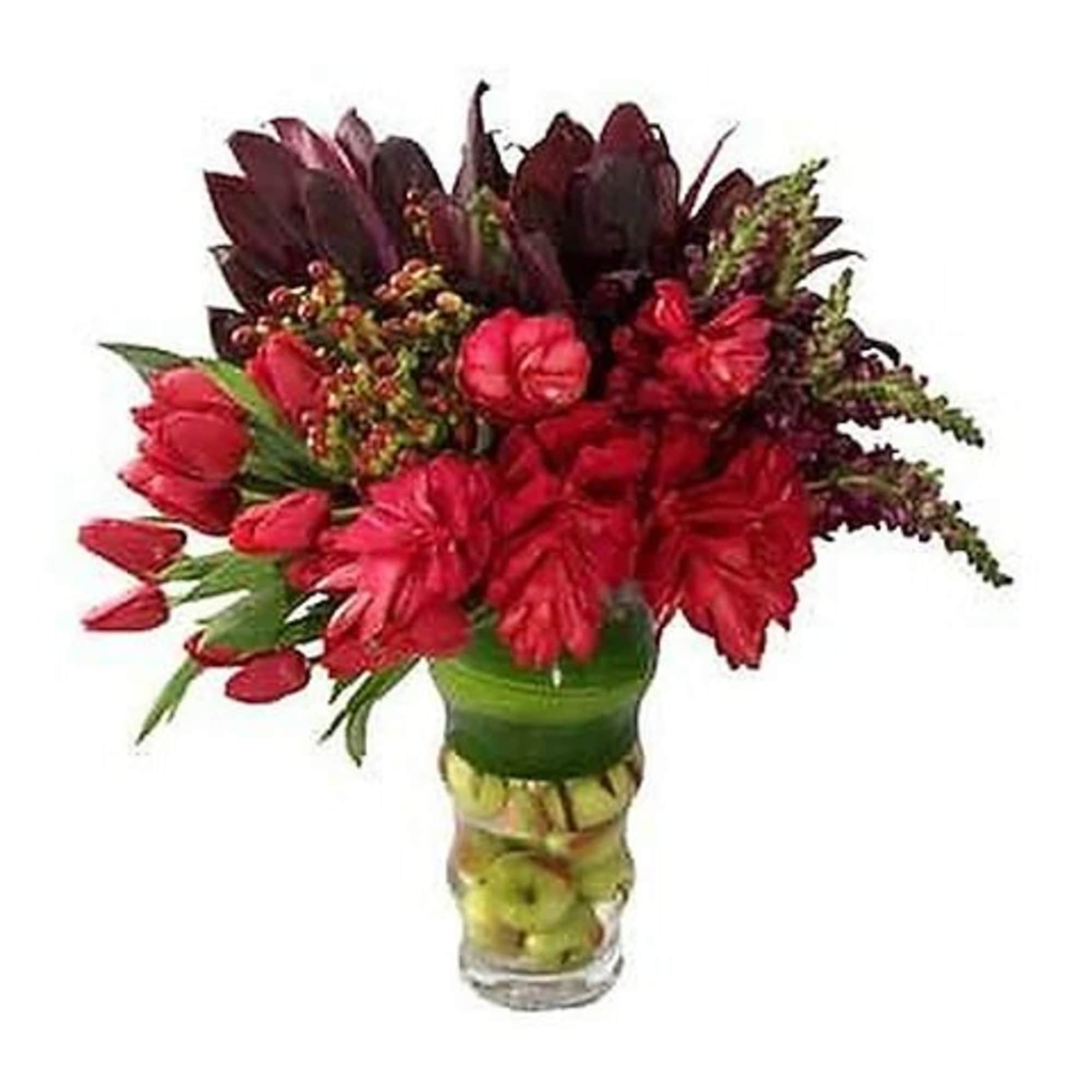 Bring home the tropics of Hawaii in this beautiful and exotic arrangement.