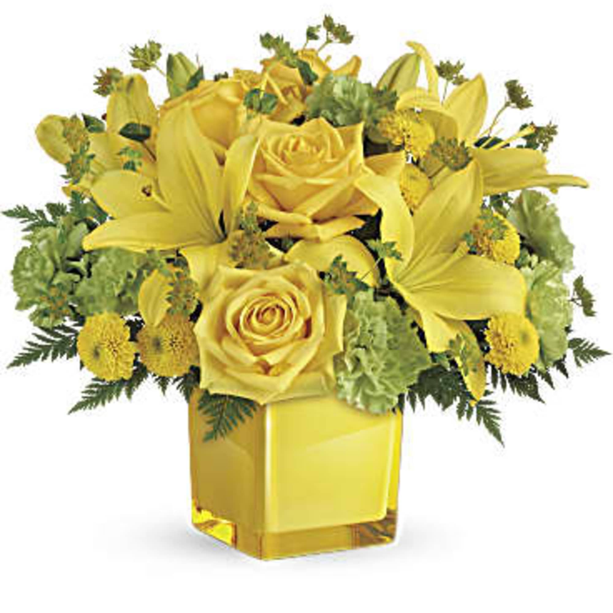 Yellow roses and lilies arranged in a square glass vase