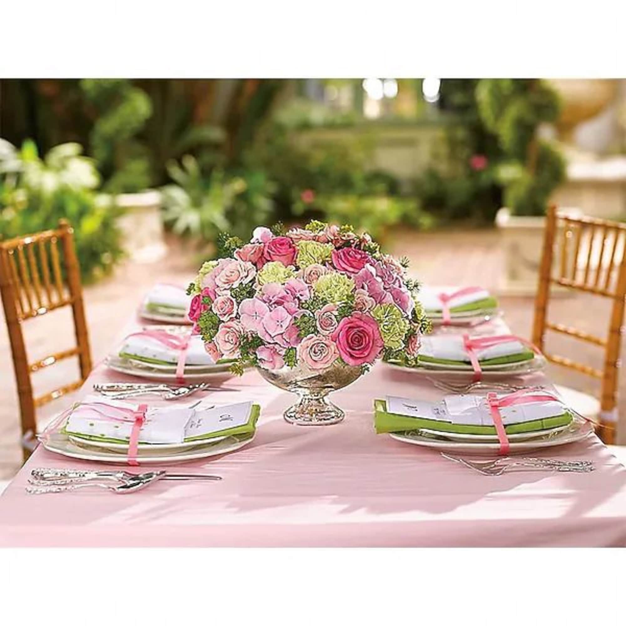 Blissful. Beautiful. A brilliant choice of colors. Pink and green centerpieces are