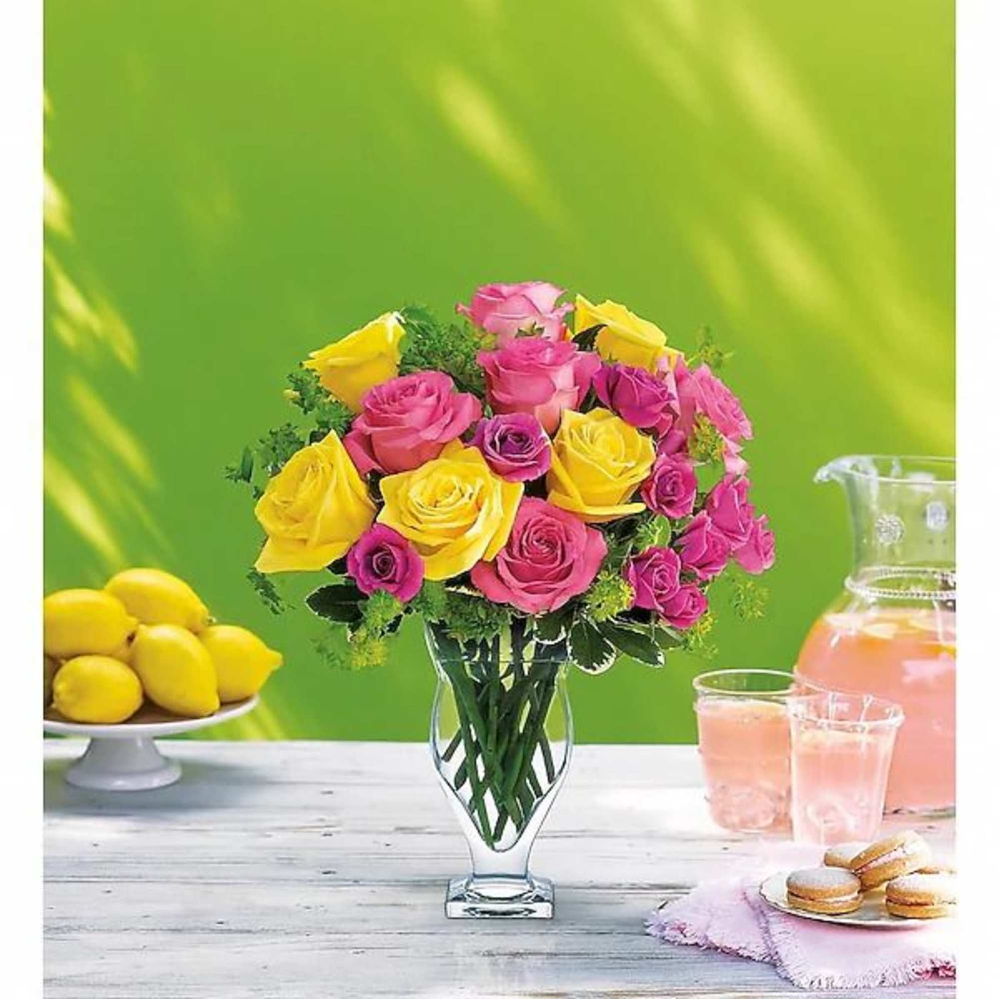 Pink lemonade, anyone? This stunning summertime bouquet of pink and yellow roses