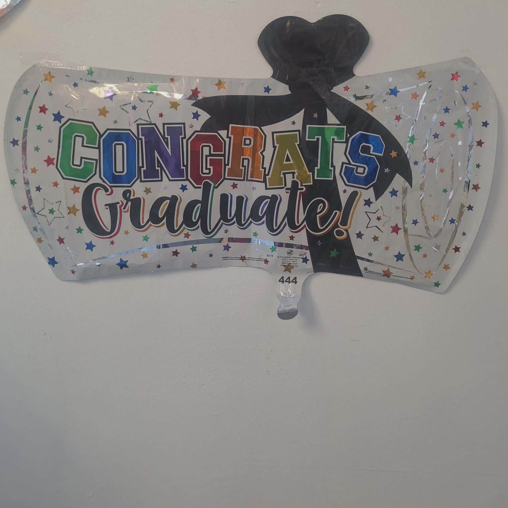 Graduation balloon with colorful "Congrats Graduate!" text