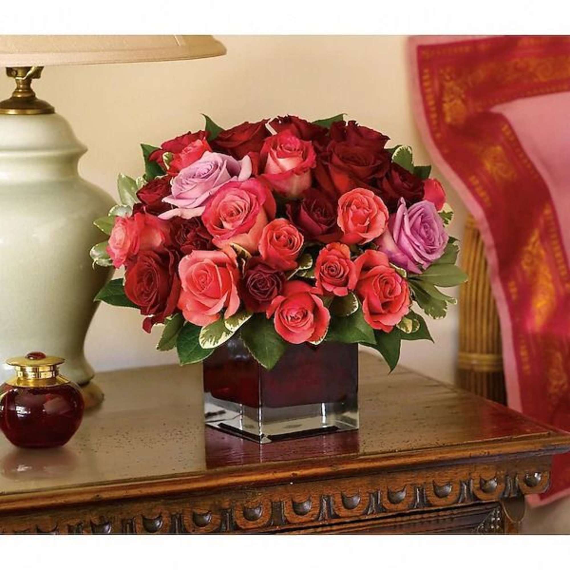 Romantic roses in passionate shades of red, pink and purple express love