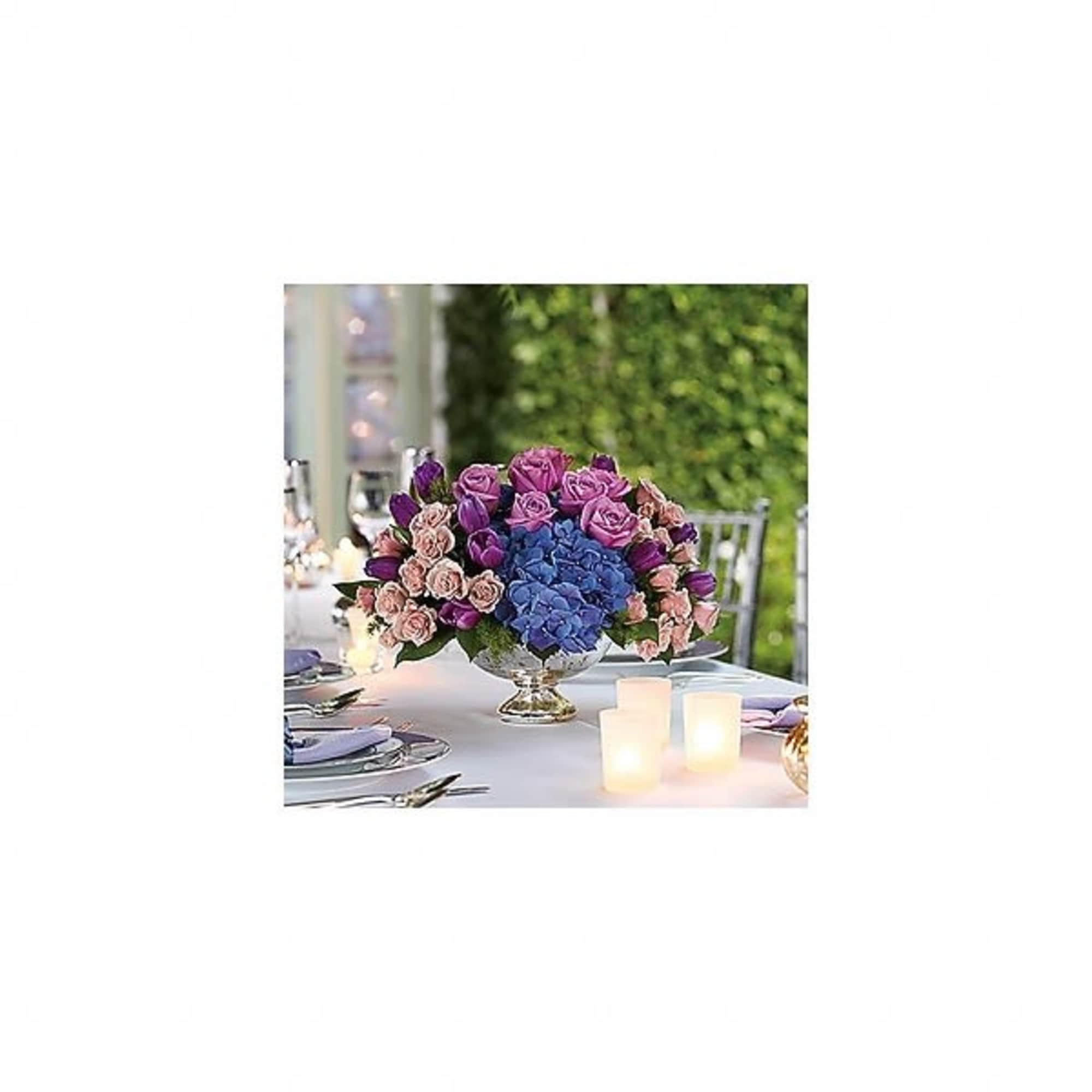 Majestic and magical. Exciting and Elegant. This jewel toned flower centerpiece is