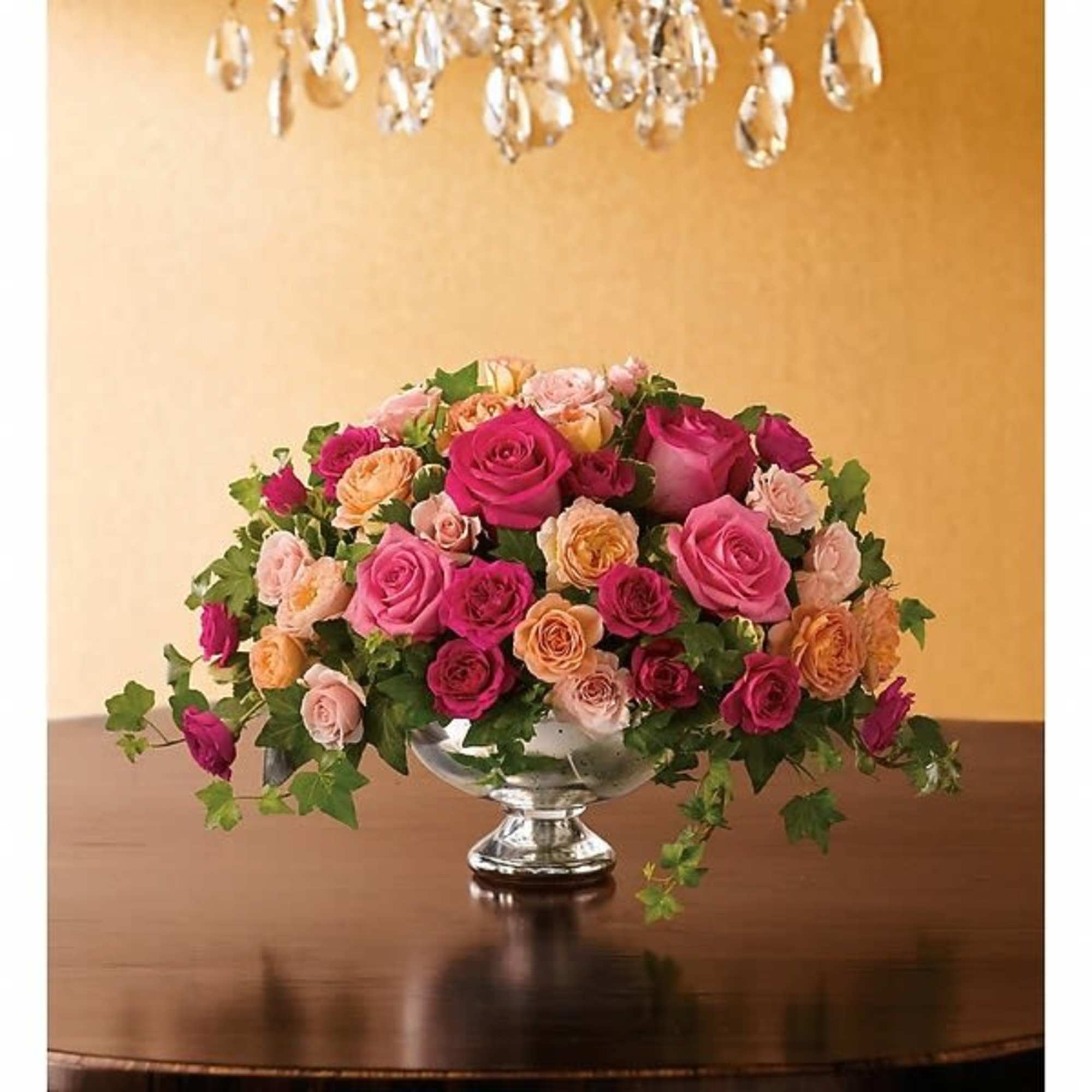 A formal arrangement is more fun in hot pink! This feminine array