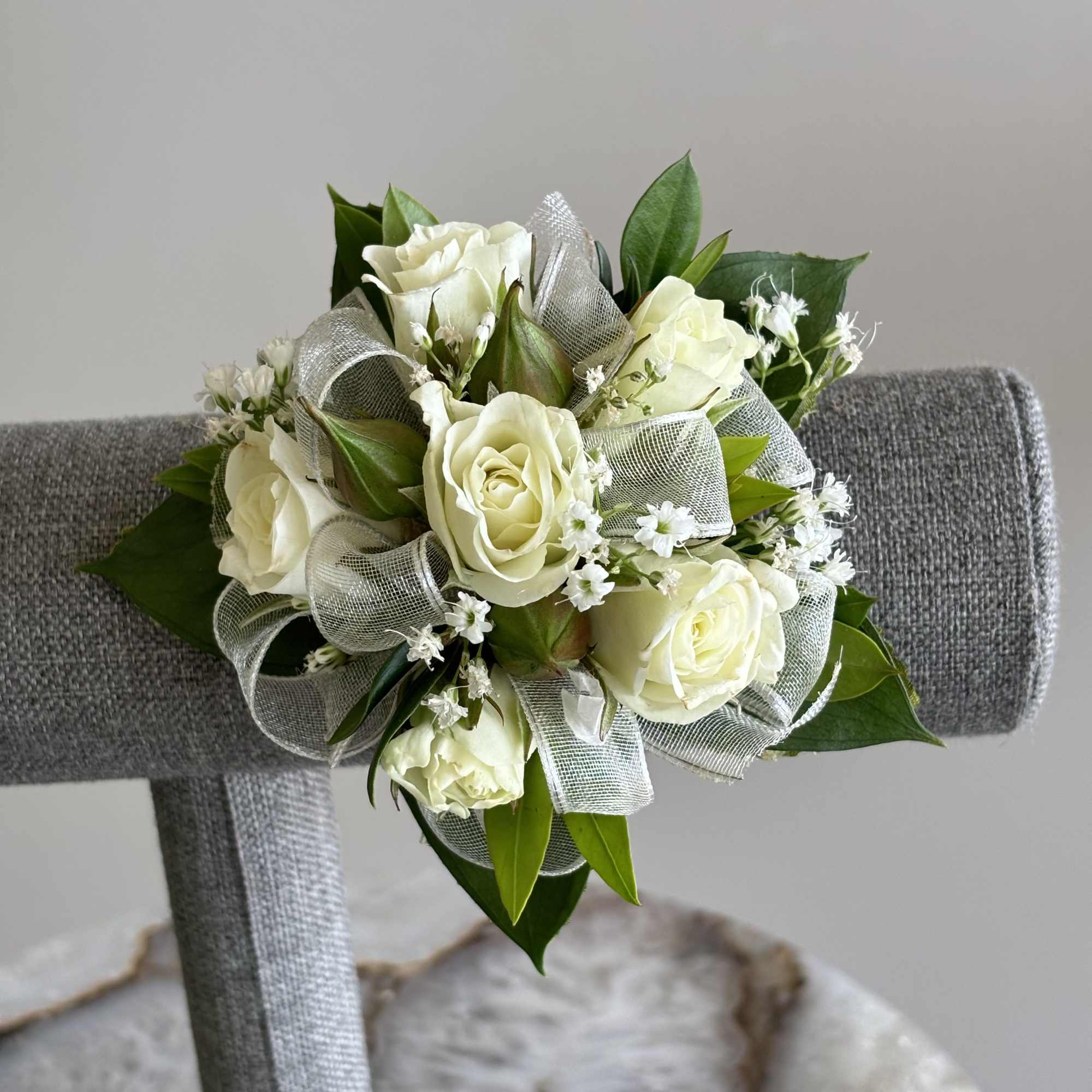 Photographed are multiple examples of corsages that we have made, you can