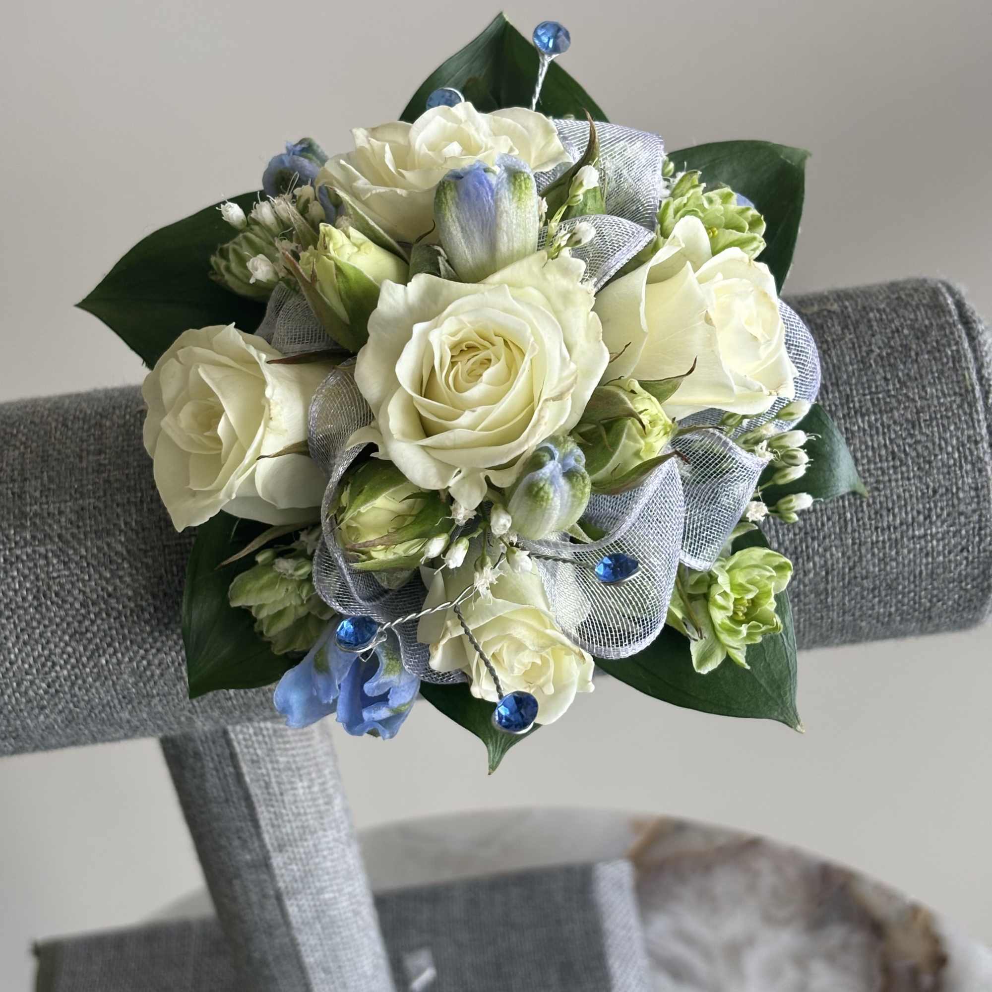 Photographed are multiple examples of corsages that we have made, you can