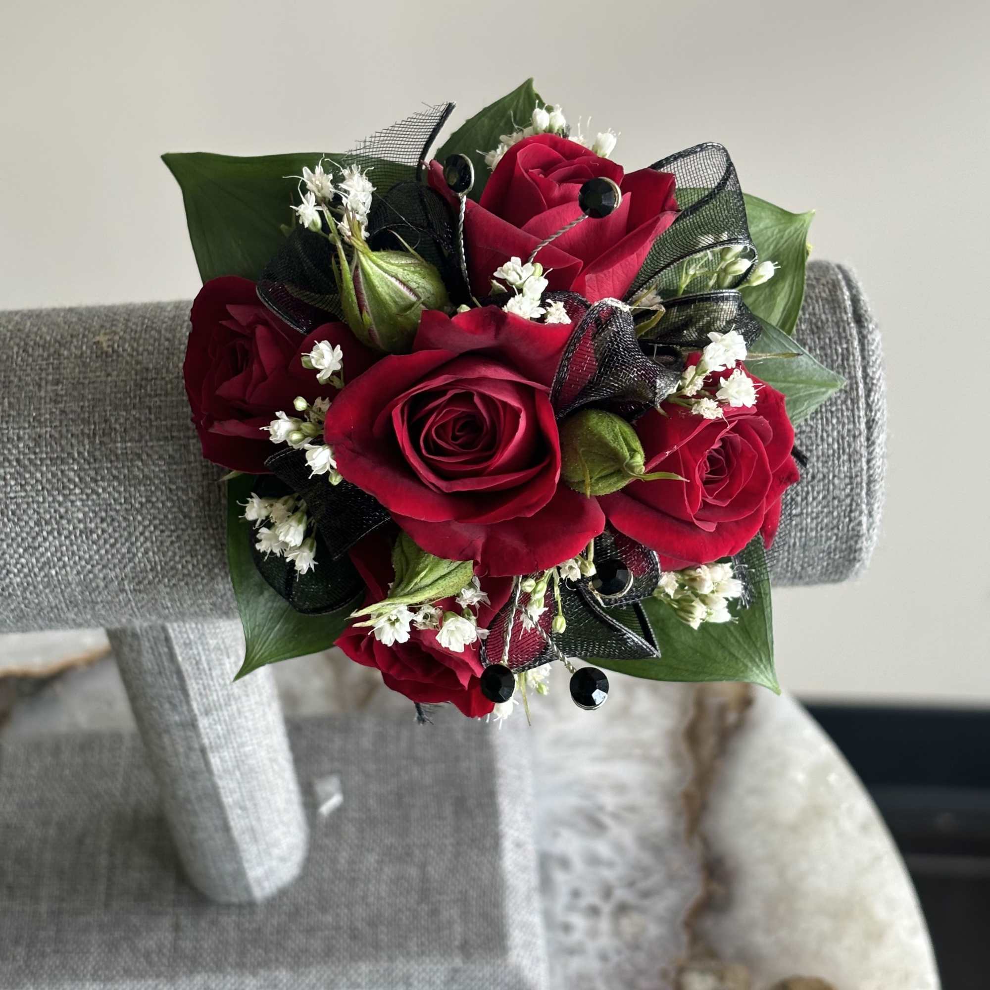 Photographed are multiple examples of corsages that we have made, you can