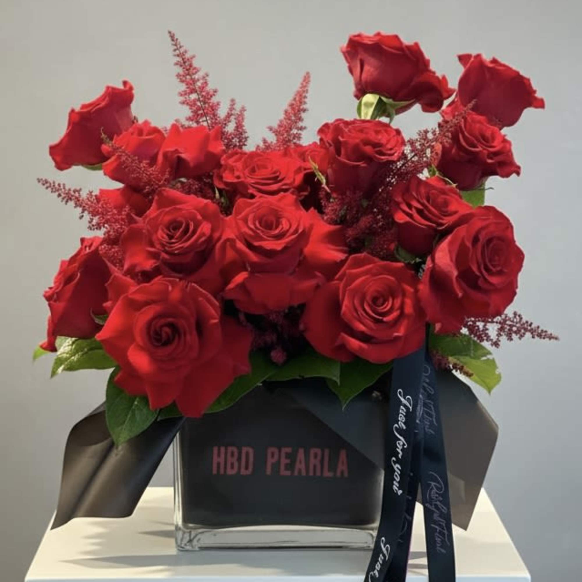 Decadent rose bouquet. Standard arrangement is red, but special color requests are