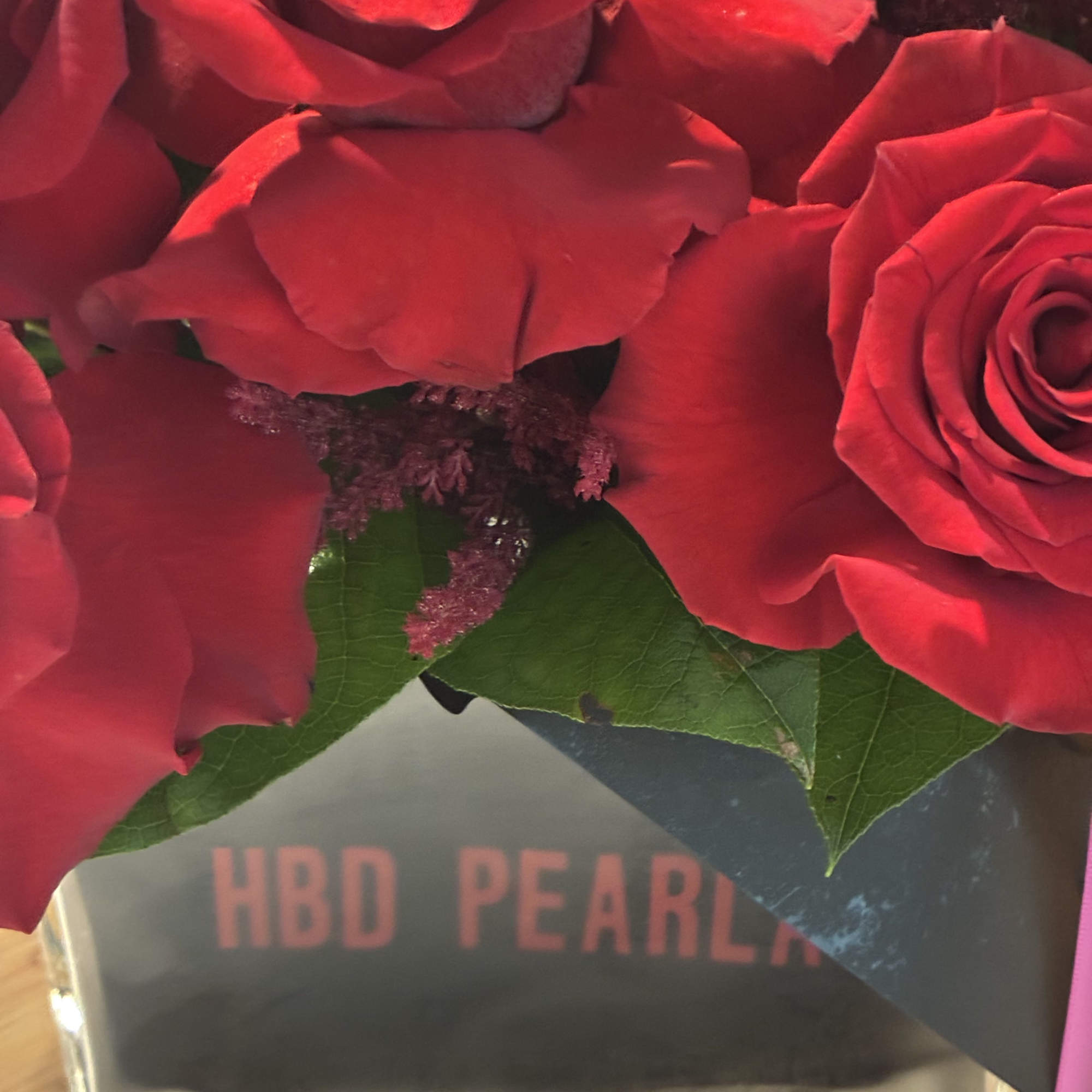 Decadent rose bouquet. Standard arrangement is red, but special color requests are