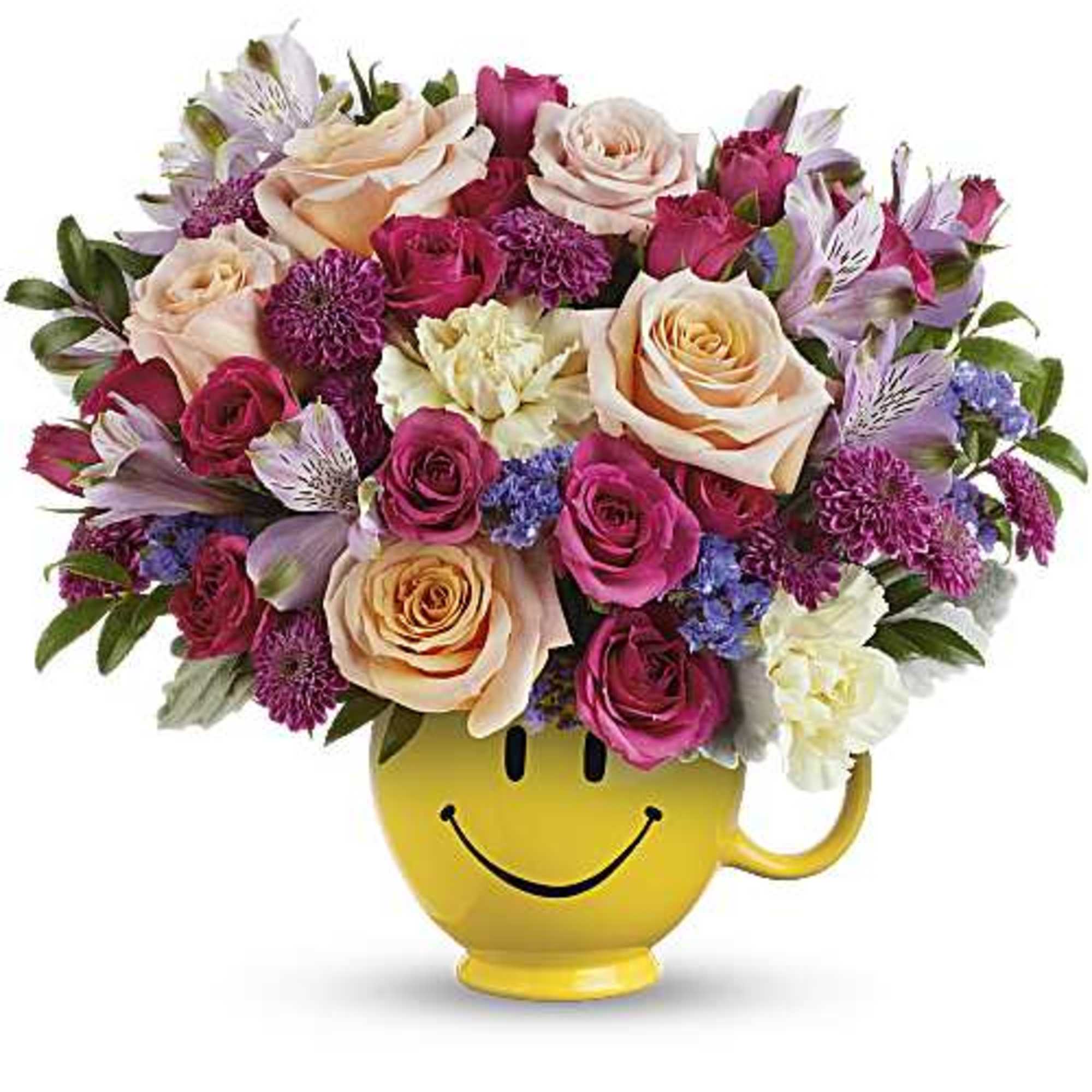 Send a cup of cheer with colorful blooms in a smiling ceramic