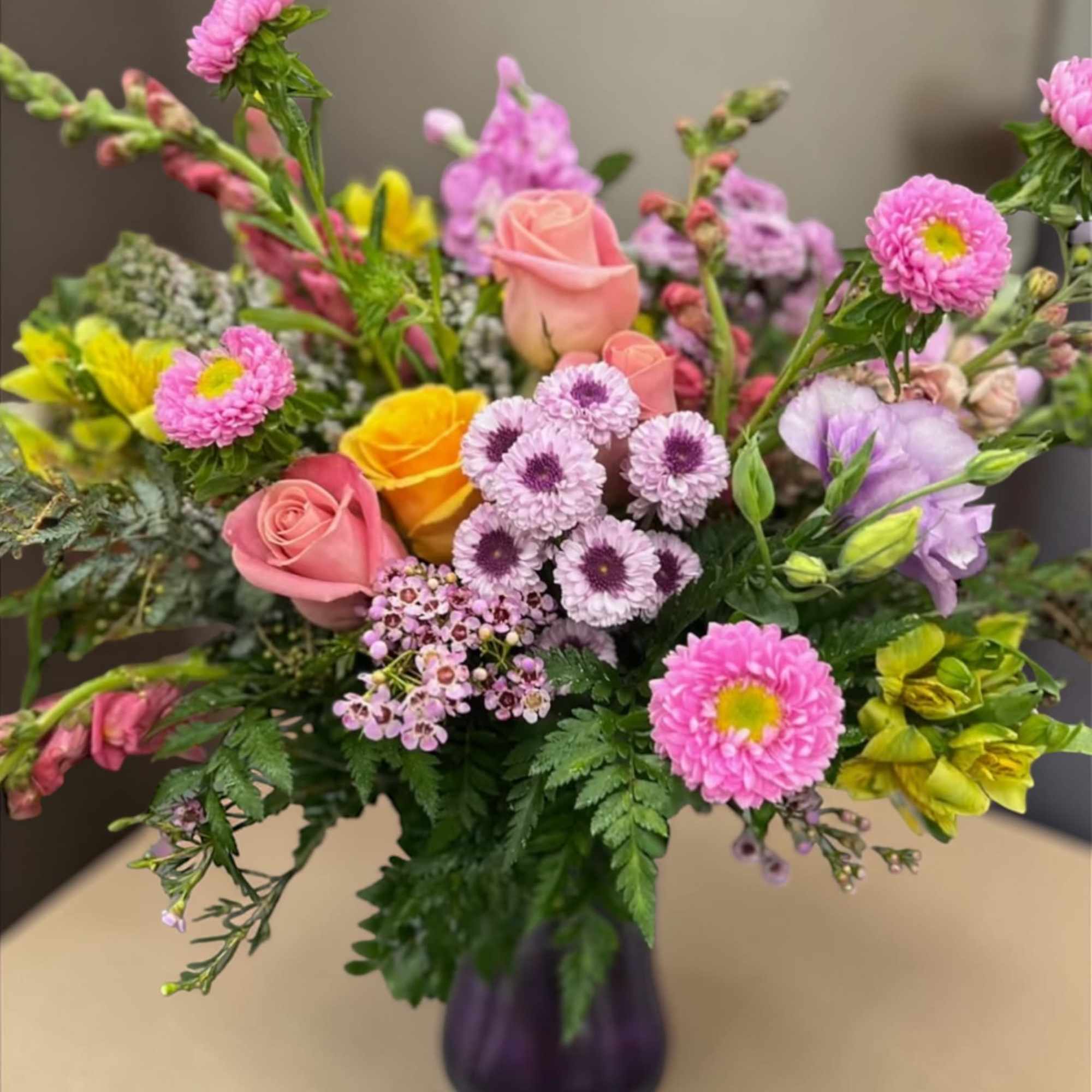Mix of flowers, Flowers may Vary in color and style do to