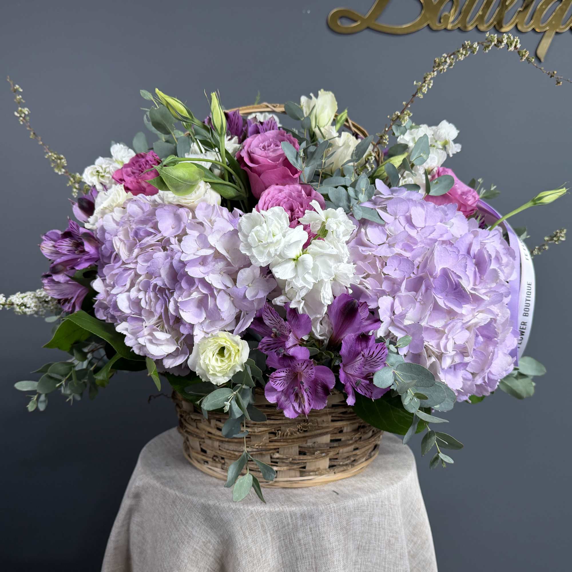 The Lavender Dreams Basket is a beautifully crafted and elegant floral arrangement