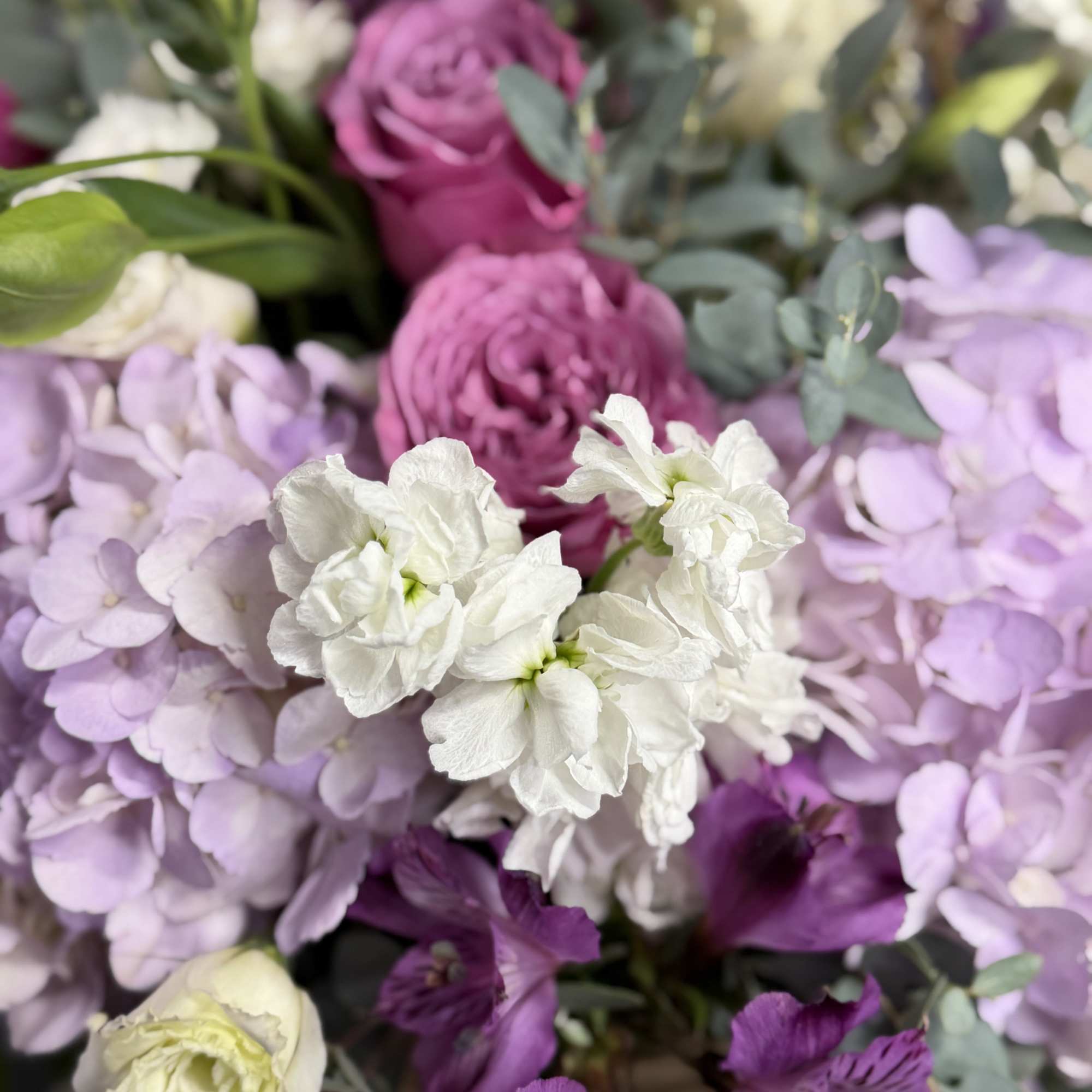 The Lavender Dreams Basket is a beautifully crafted and elegant floral arrangement