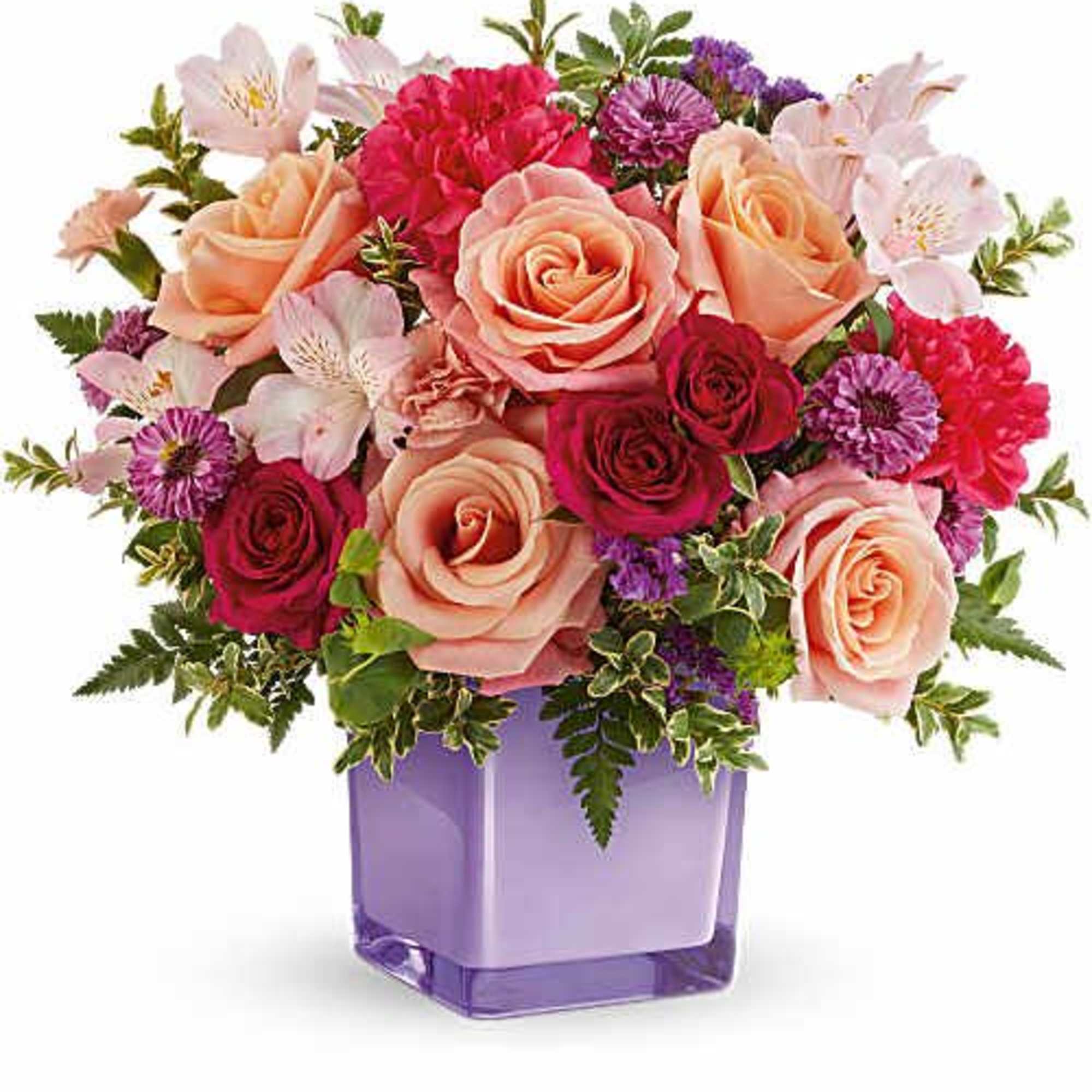 A treat for the senses,  Sunset Sorbet Bouquet blends peach, pink