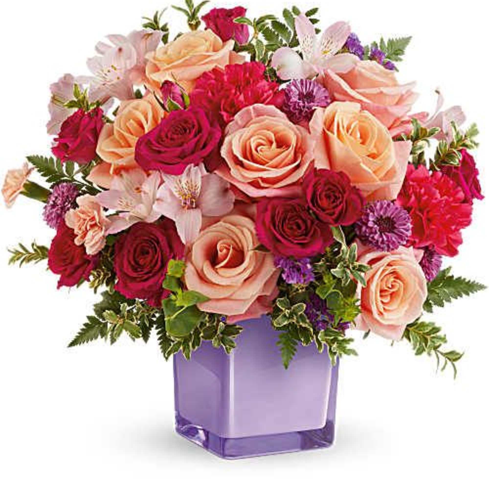 A treat for the senses,  Sunset Sorbet Bouquet blends peach, pink