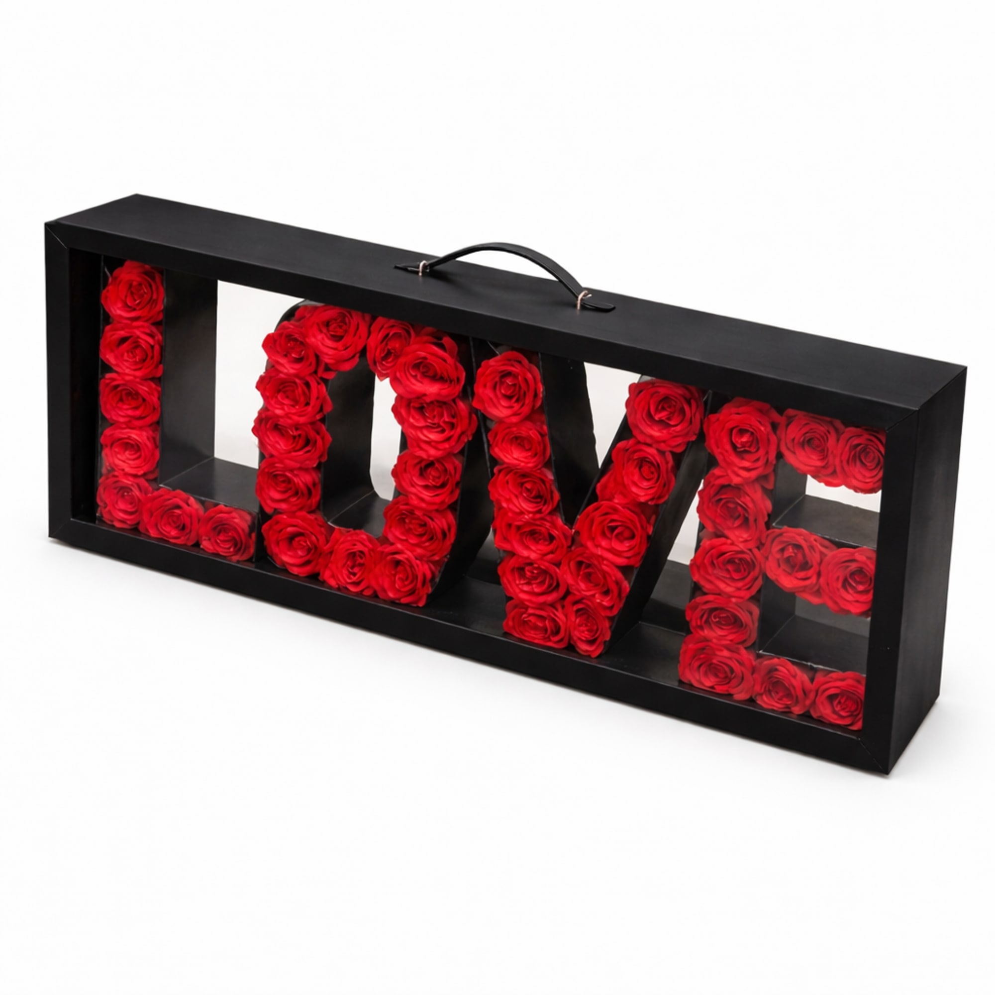 Black box sign spelling LOVE with red roses