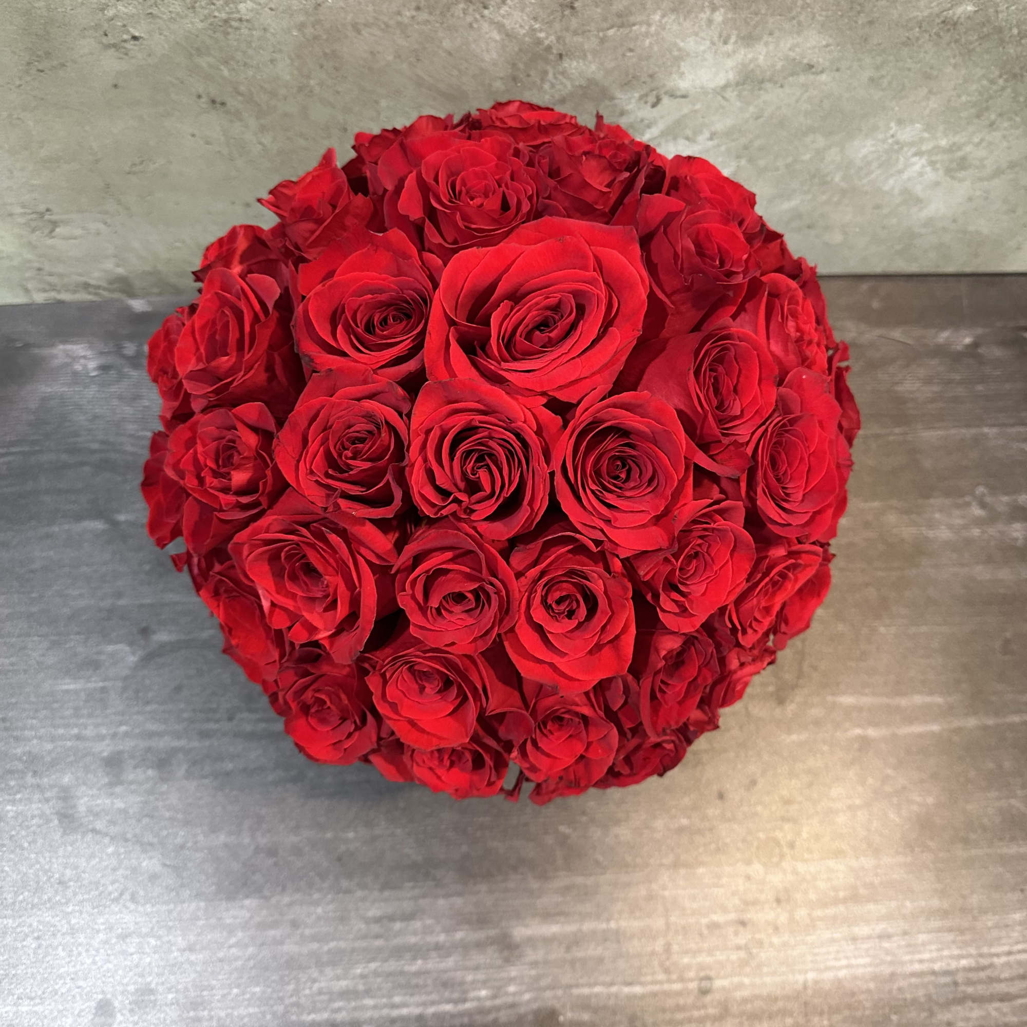 Round bouquet of red roses