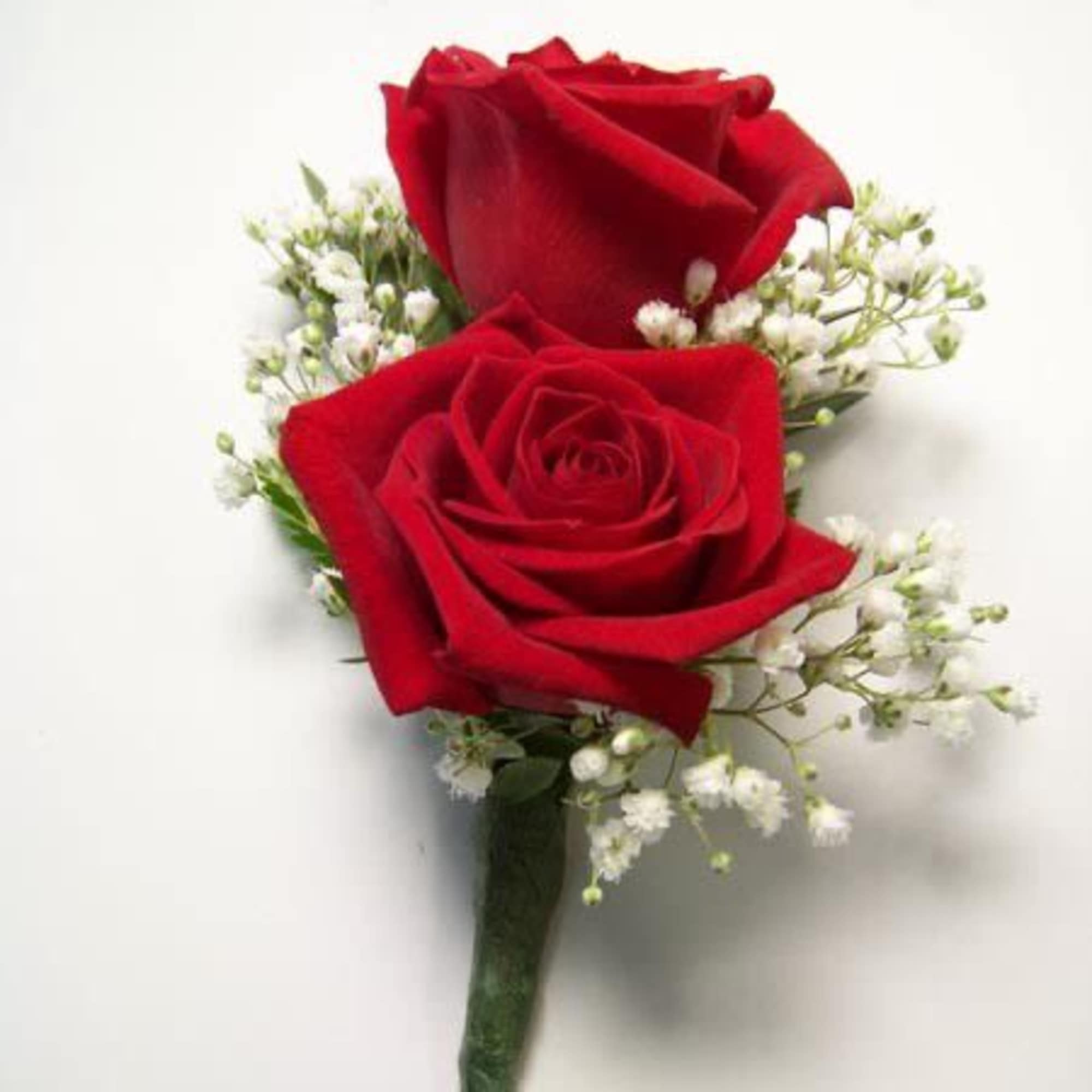 A classic red rose boutonni&egrave;re that compliments any suit. Perfect for prom