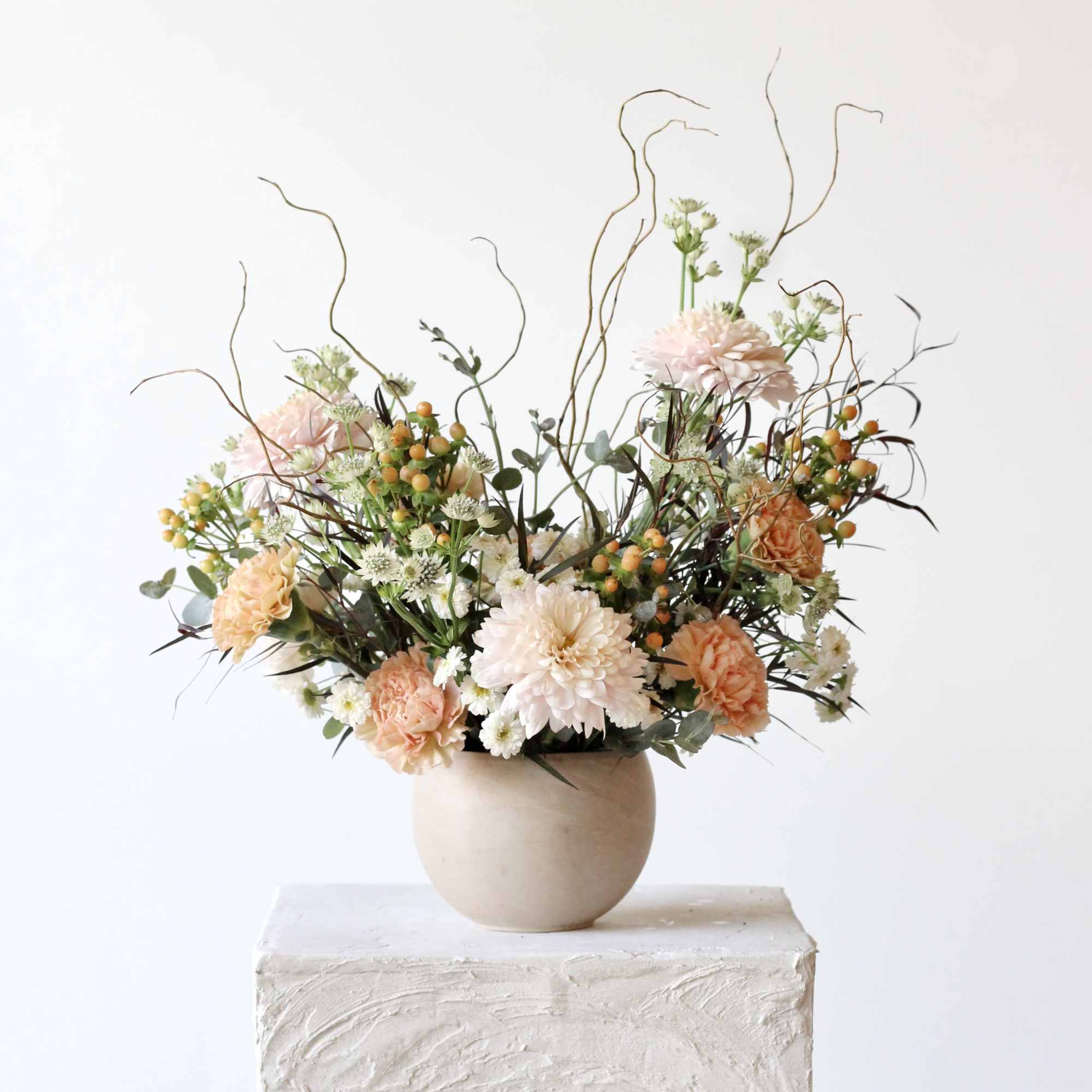 Our "Very Demure" arrangement offers a refreshing alternative to traditional florals. Featuring
