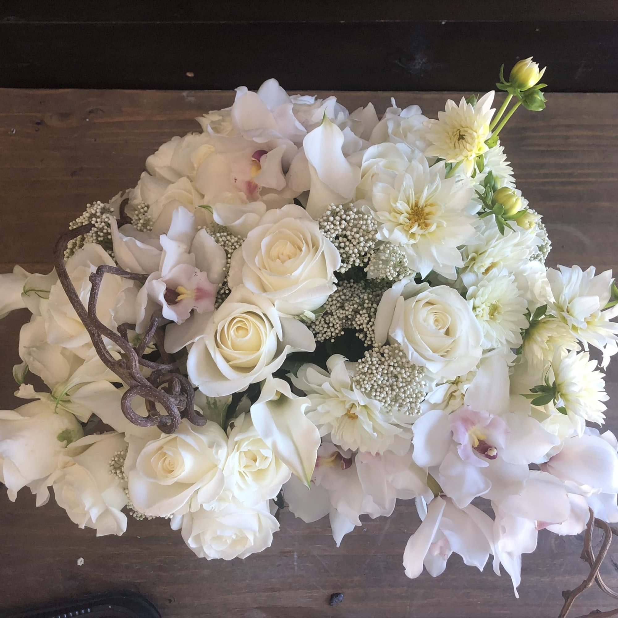 This design will include all white flowers. Some of these flowers may