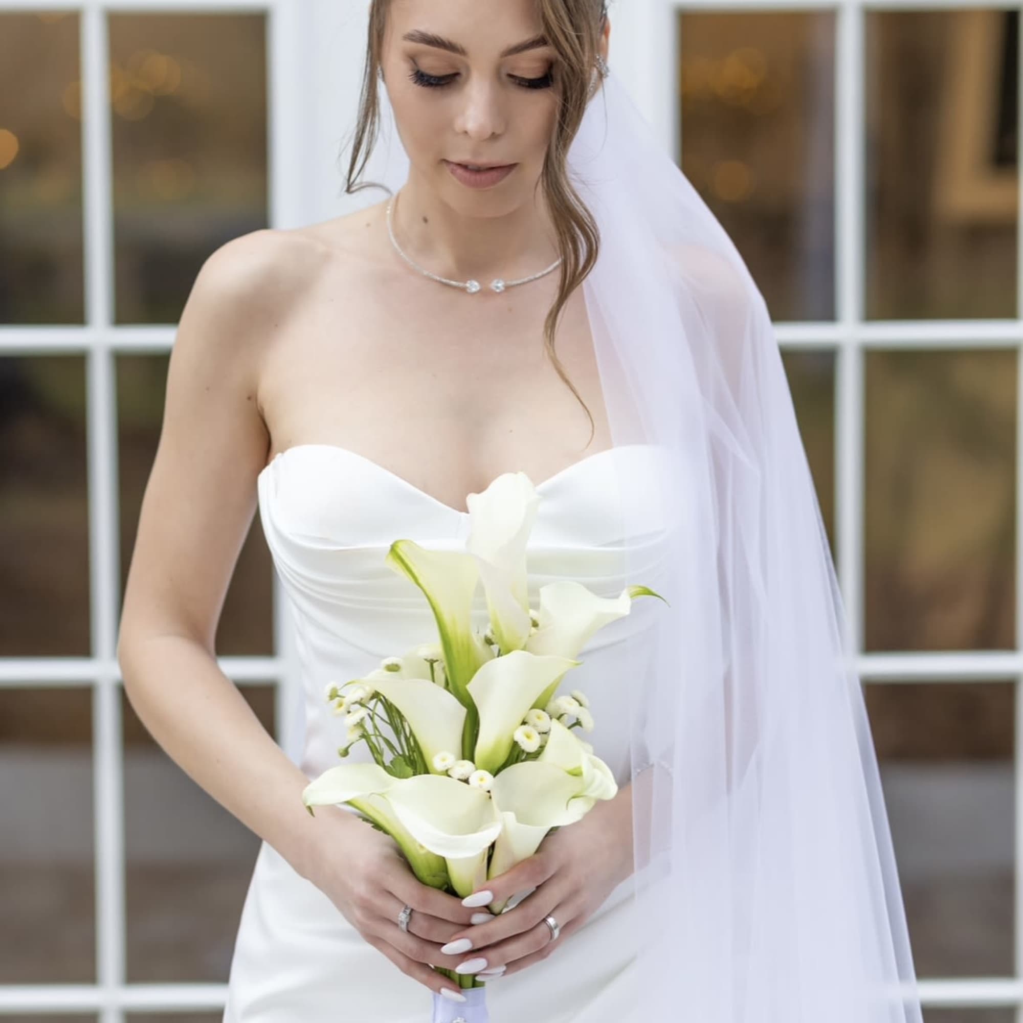 Calla Elegance is a sophisticated bridal bouquet built around the natural elegance